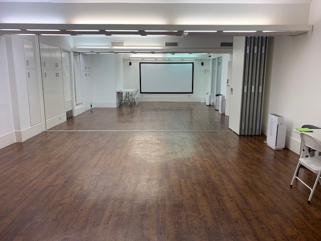 Cromer Studios event space with hardwood floor, ideal for workshops and meetings.