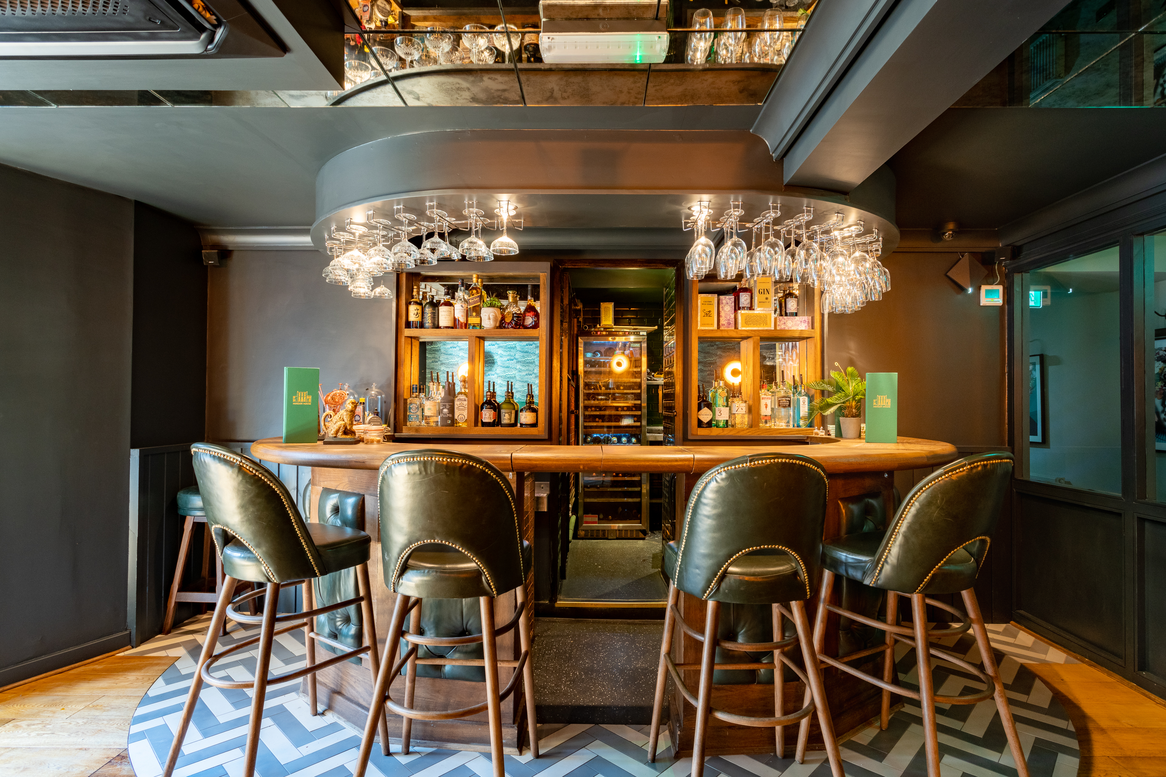 Stylish bar at Aragon House, ideal for networking events and gatherings.