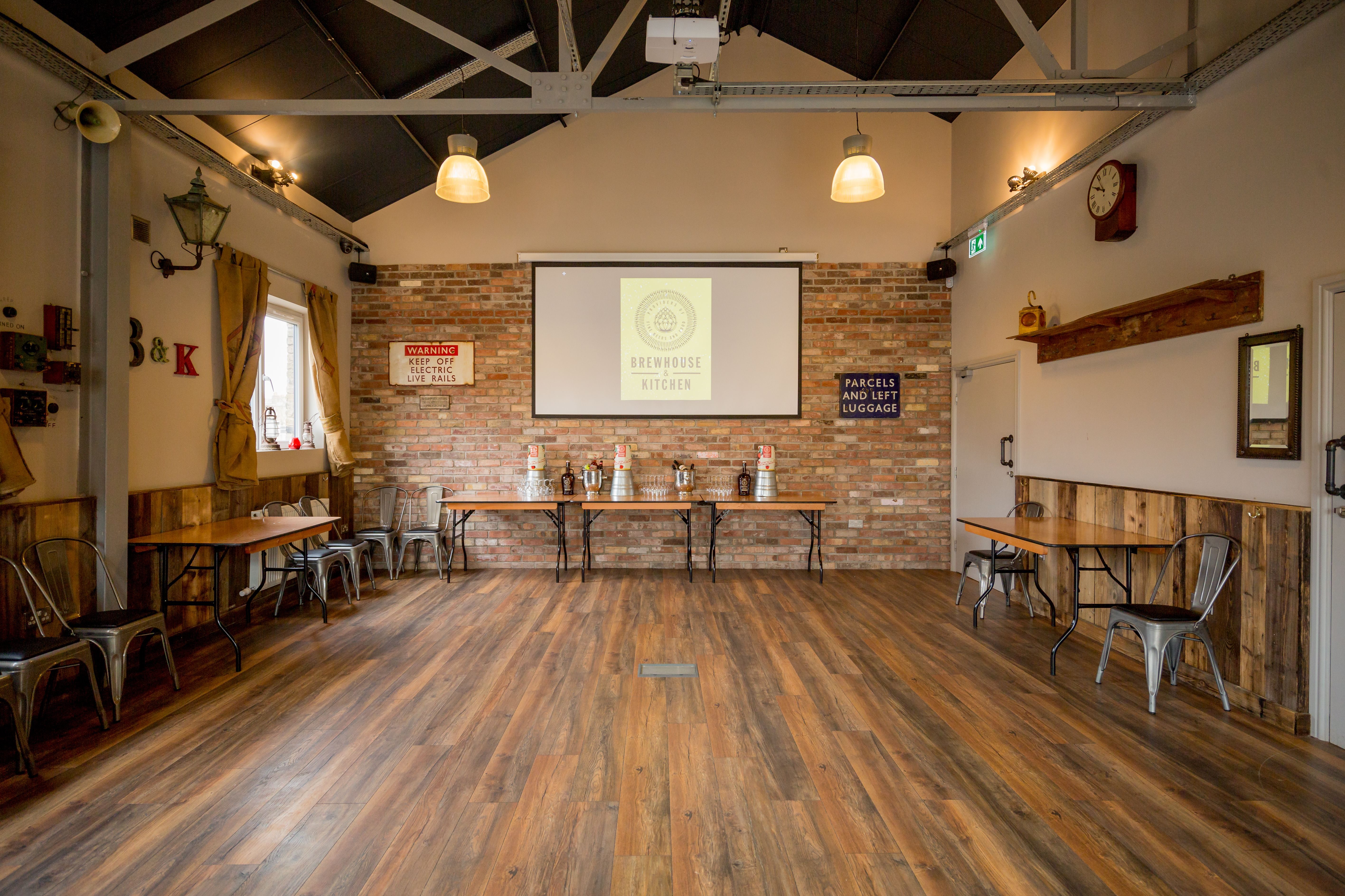 Versatile event space in Brewhouse & Kitchen Highbury with rustic charm, ideal for meetings.