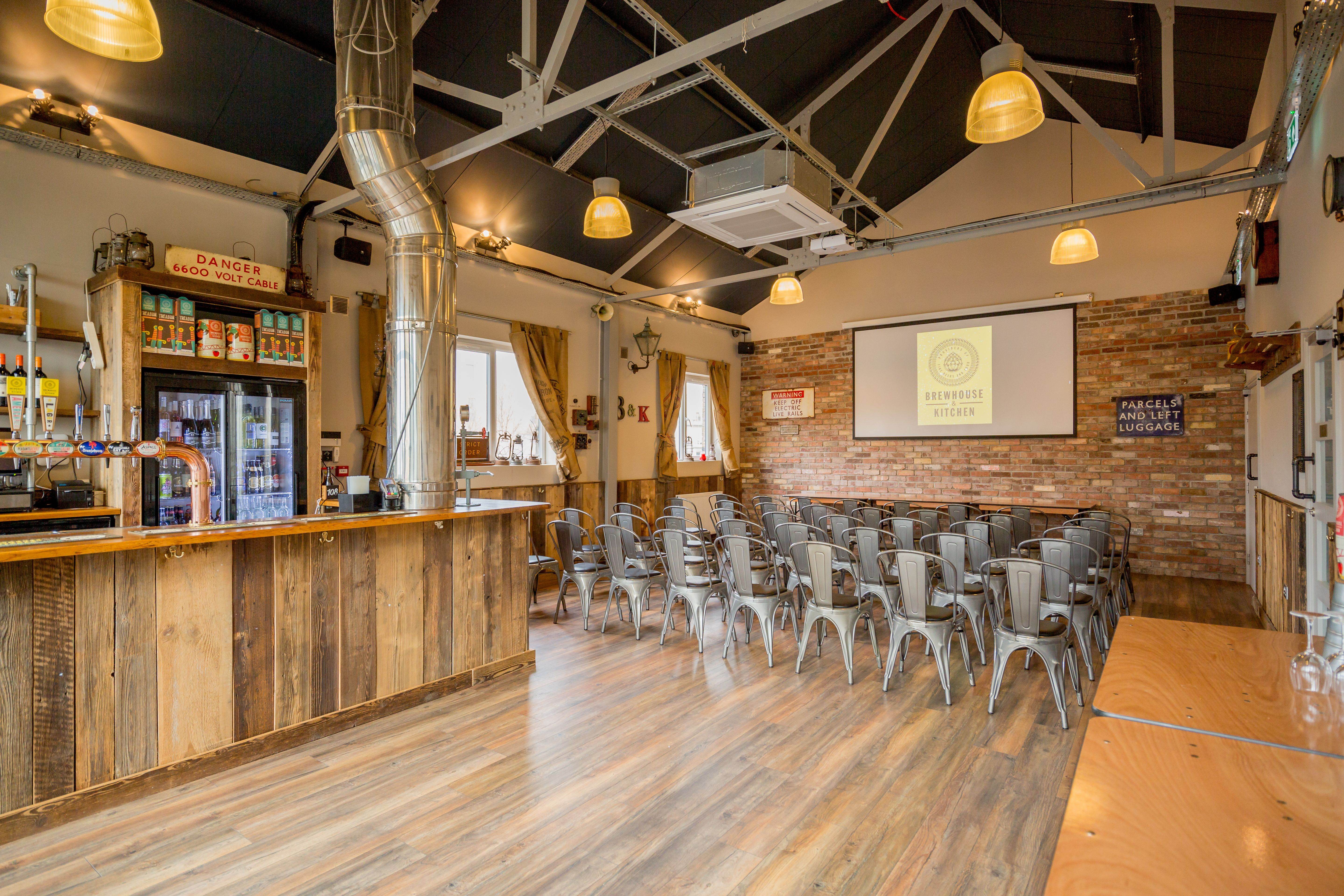 The Tap Room event space with bar, ideal for meetings and workshops in Highbury.