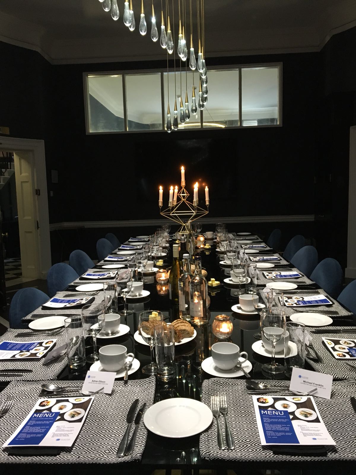 Elegant dining table setup with candles for a formal event at The Boardroom, Space14.