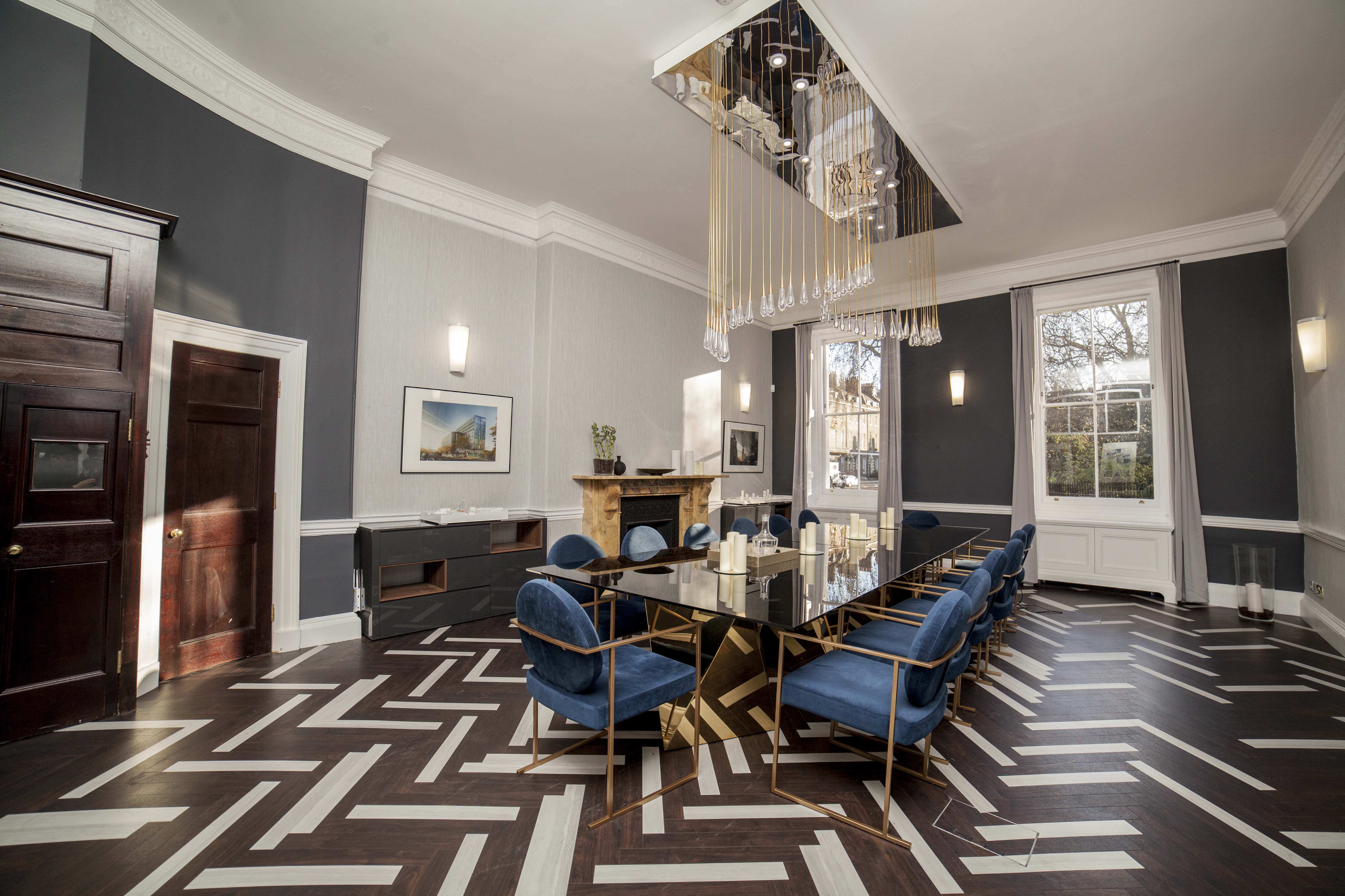 Sophisticated meeting room with elegant table, ideal for corporate events and discussions.