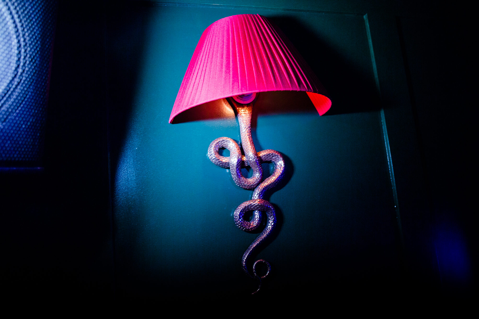 Snake lamp centerpiece for unique event decor and creative themes.