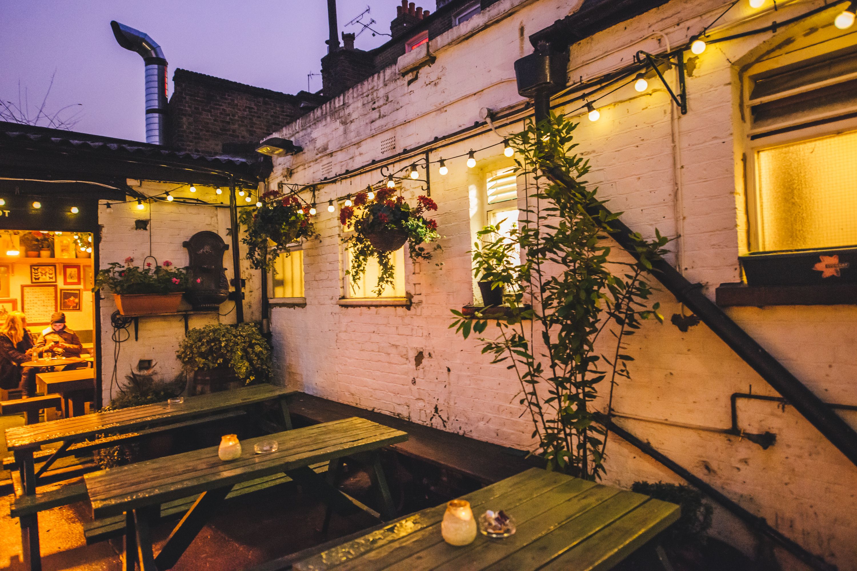 Charming outdoor venue at The Adam & Eve for networking and team-building events.