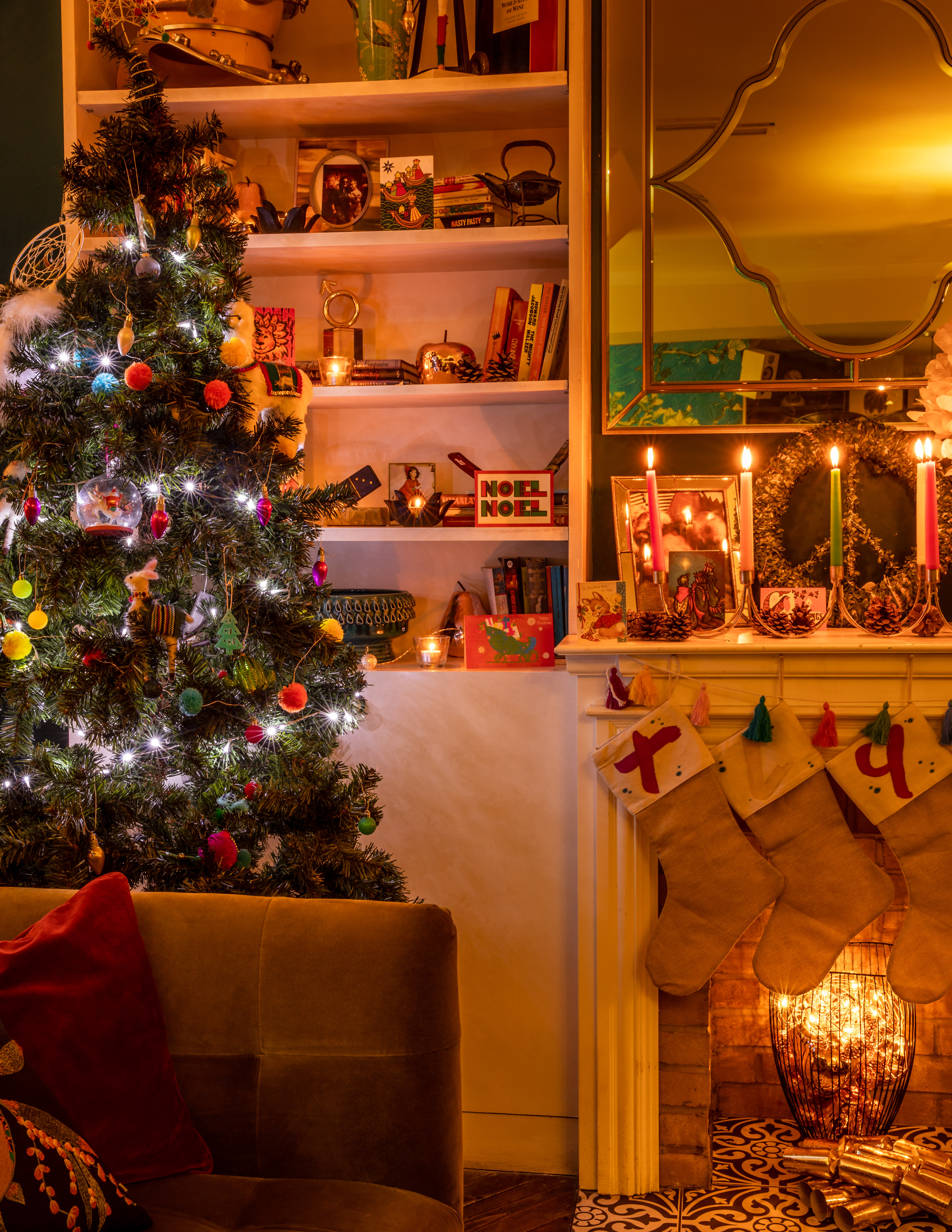 Cozy Christmas party venue with a decorated tree and festive decor at The Little Yellow Door.