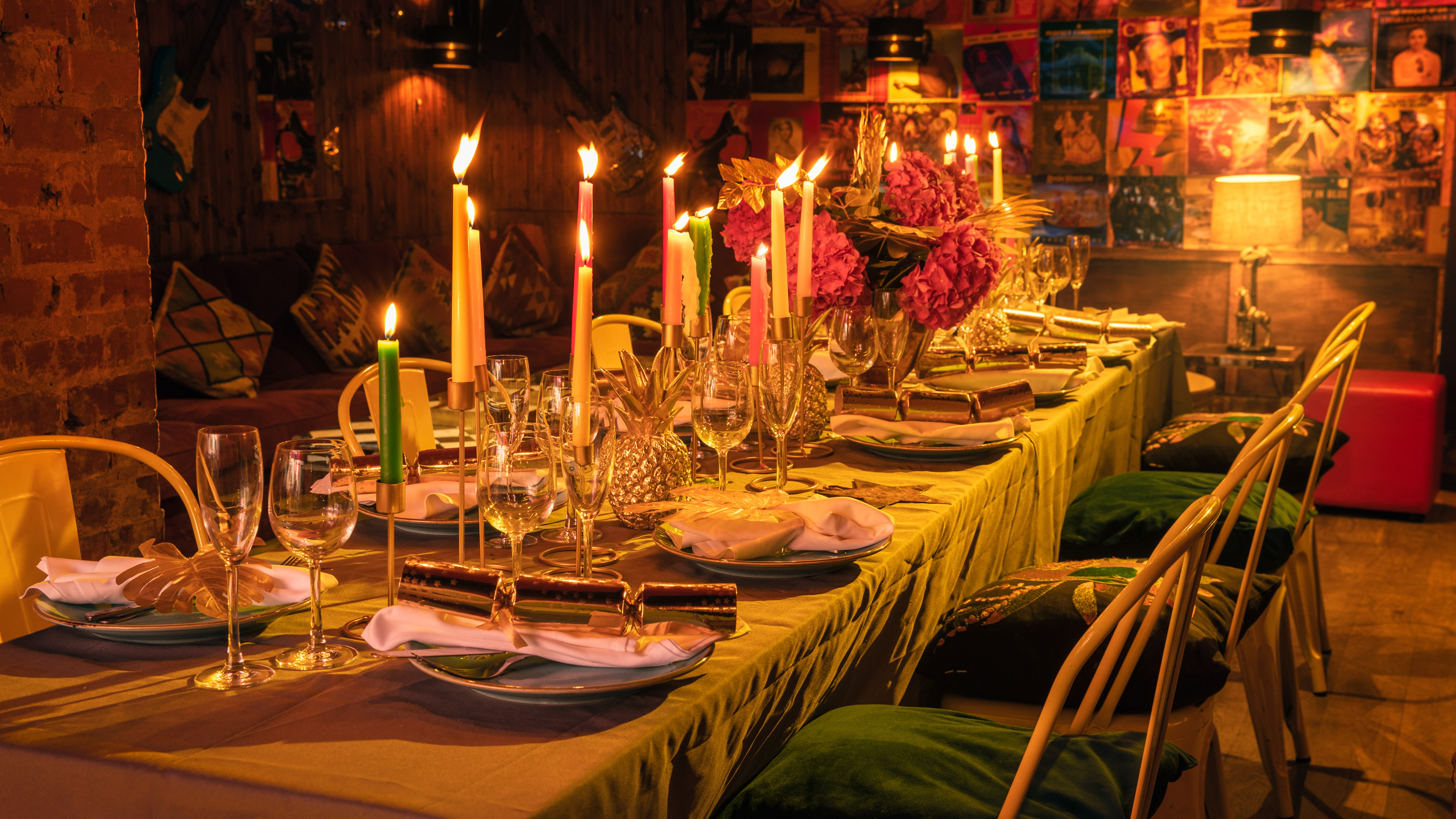 Elegant dining table with floral centerpiece for Christmas party venue hire.