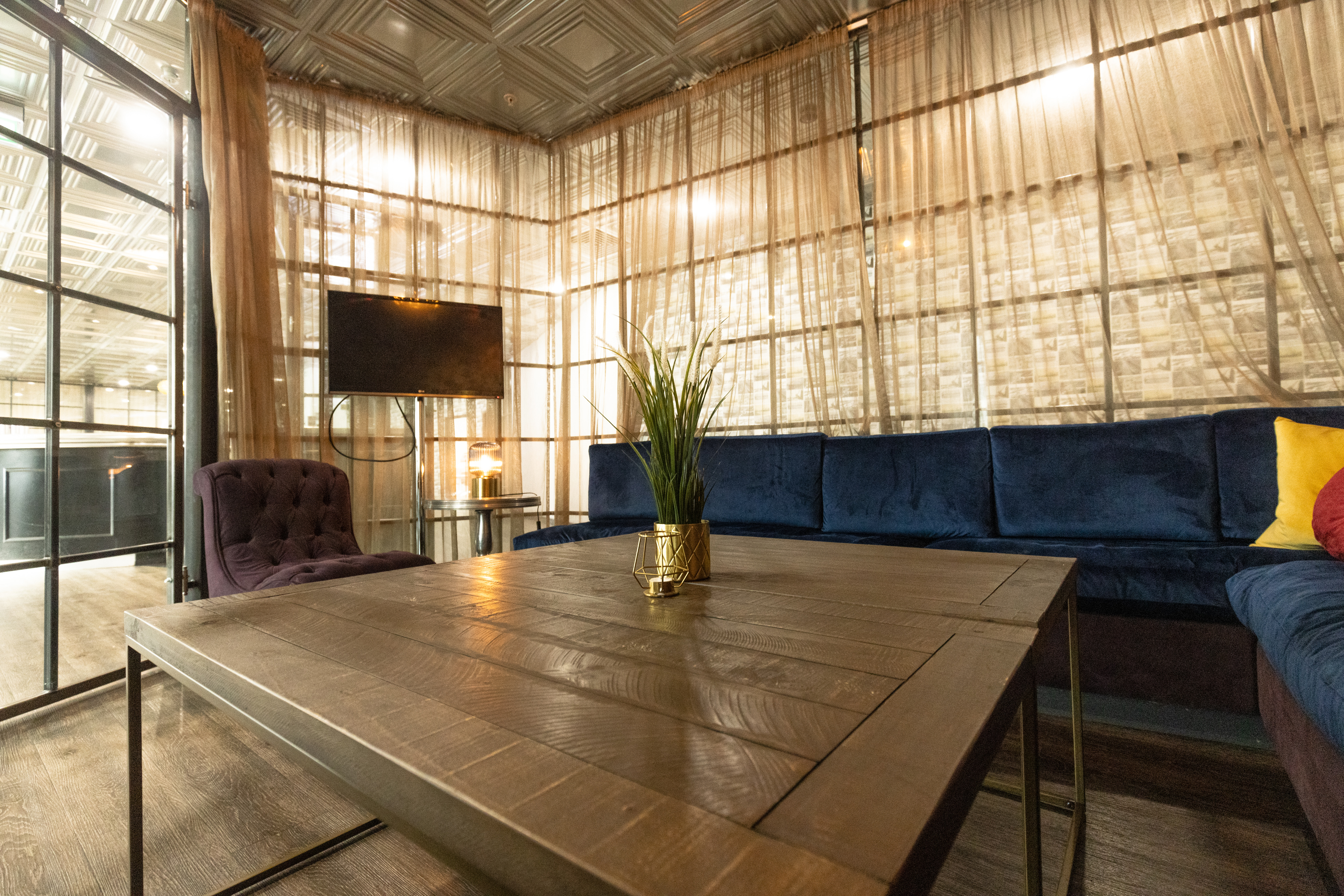 Stylish lounge area with plush seating for networking and informal meetings.