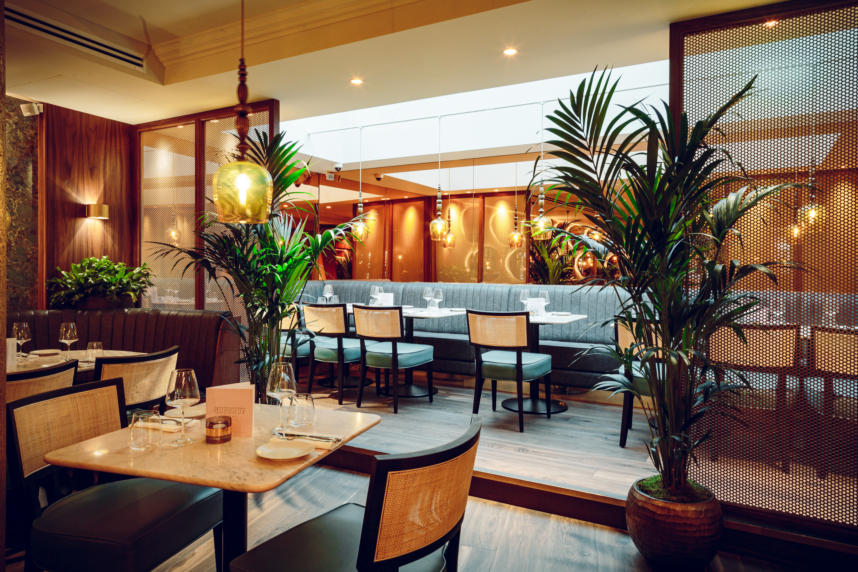 Stylish dining space in GupShup Hale, perfect for intimate meetings and events.