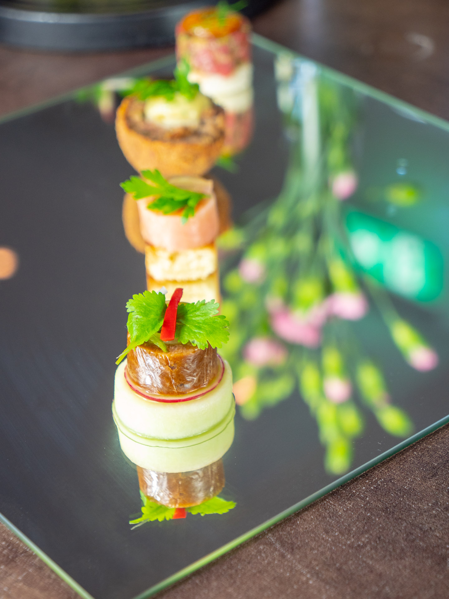 Elegant gourmet appetizer display on Champagne Route for upscale dining events.