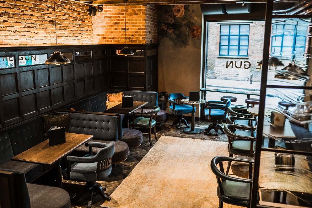 Stylish lounge in East London, cozy seating for networking events and meetings.
