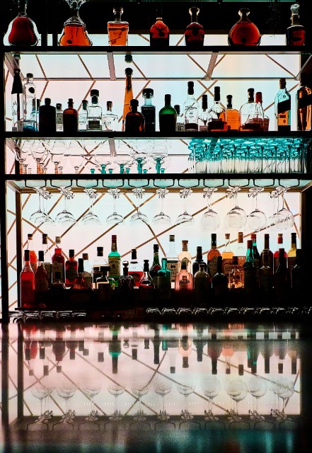 Luna Lounge bar with spirits and glassware for elegant event planning in London.