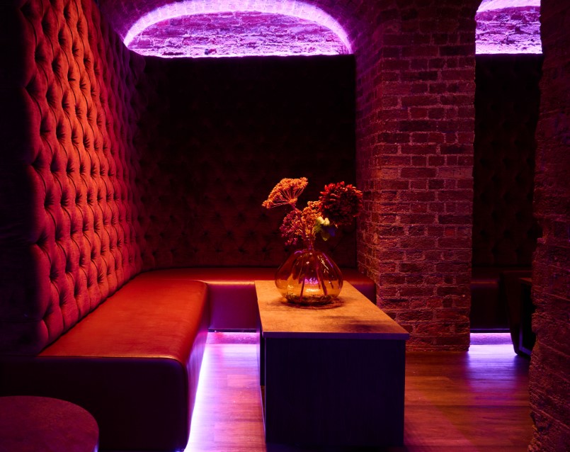 Luna Lounge in LUNA LONDON: cozy seating, elegant floral decor for networking events.