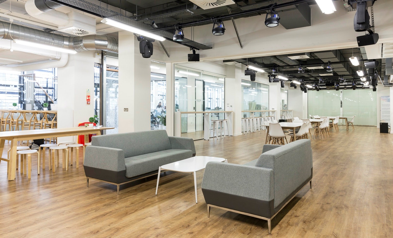 Versatile Cocoon Space with natural light, ideal for workshops and networking events.