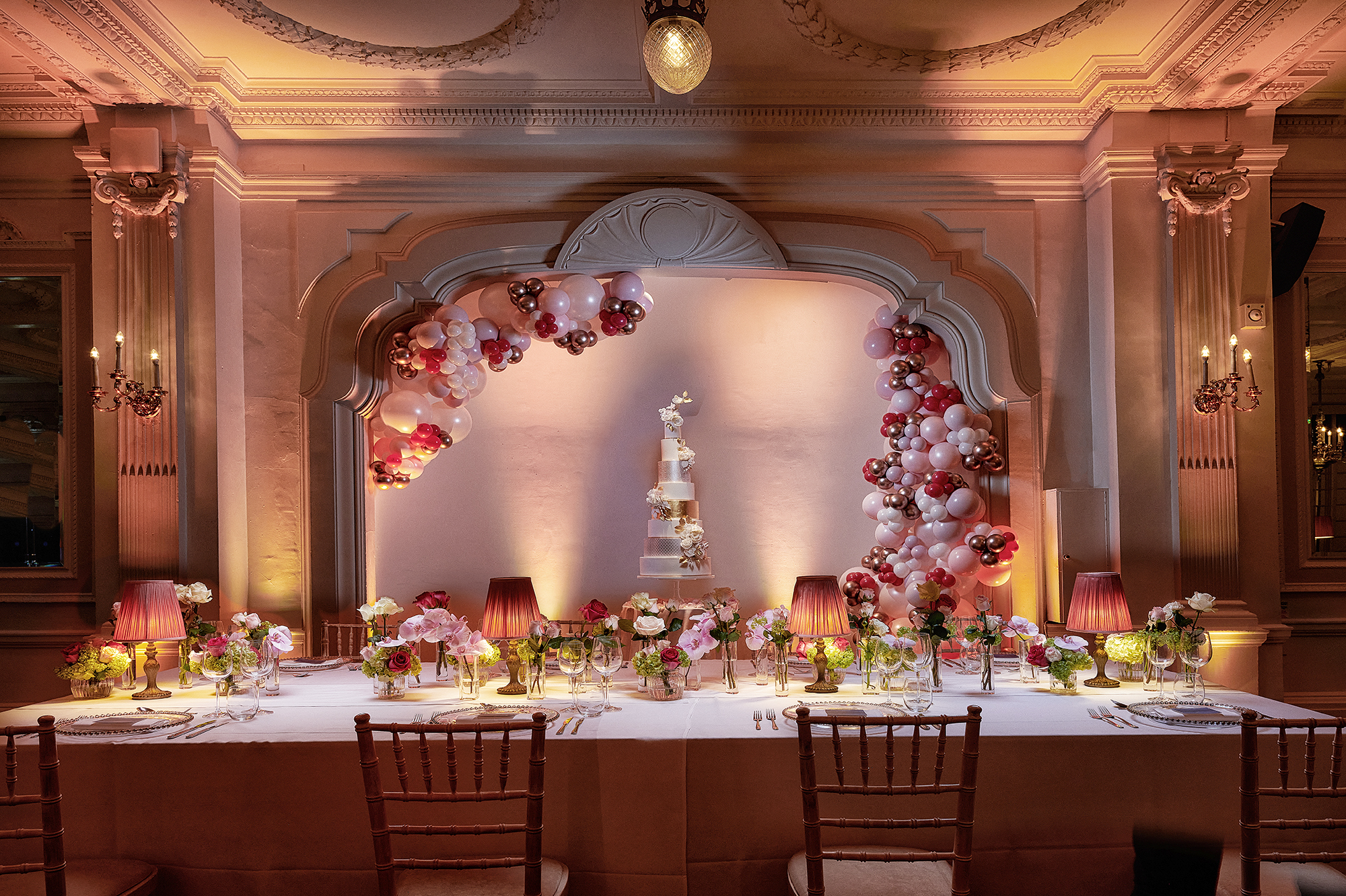 Elegant event space with balloon decor, perfect for weddings and upscale celebrations.