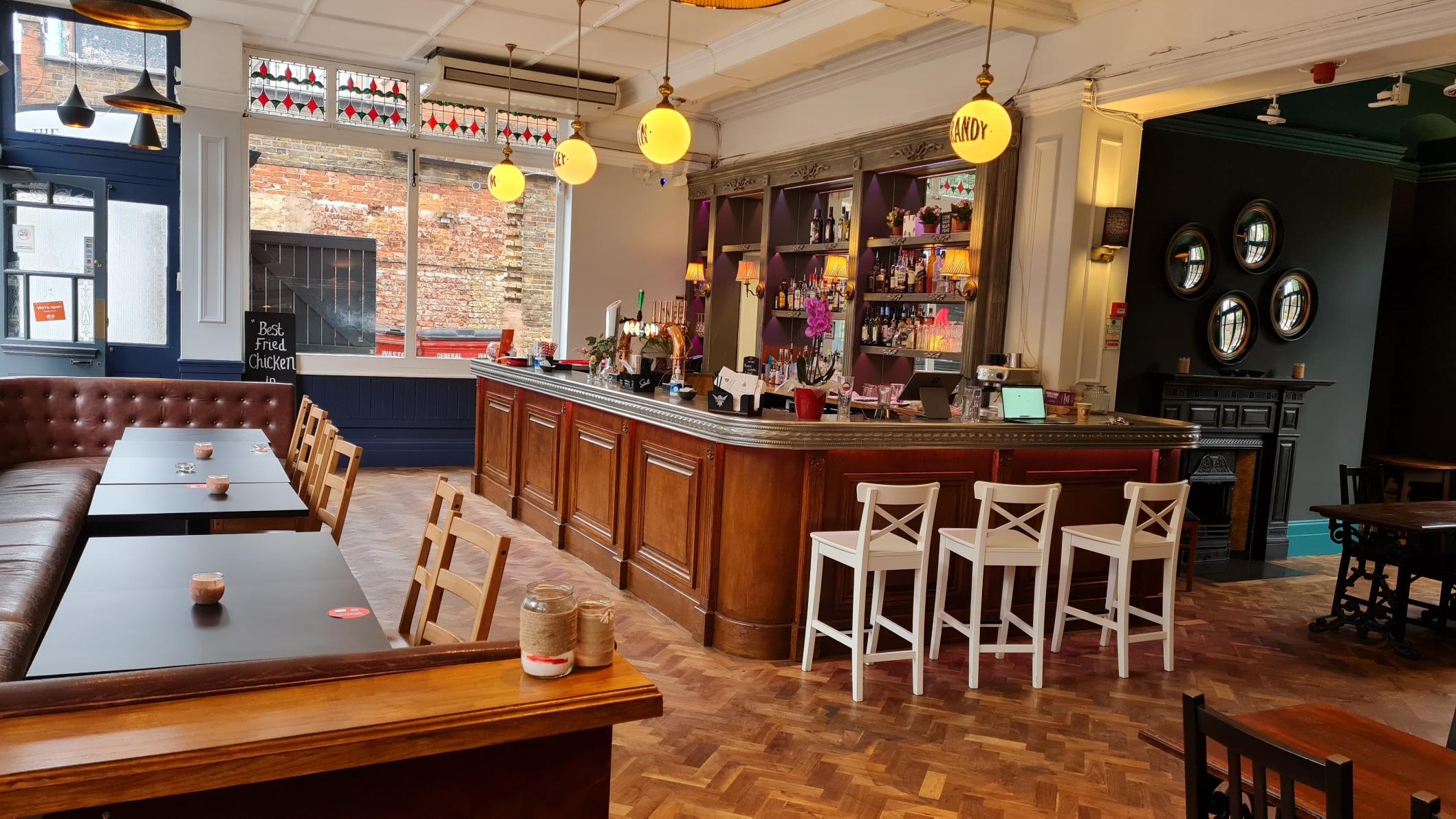 Stylish Windmill Bar with polished wood, perfect for networking events and receptions.
