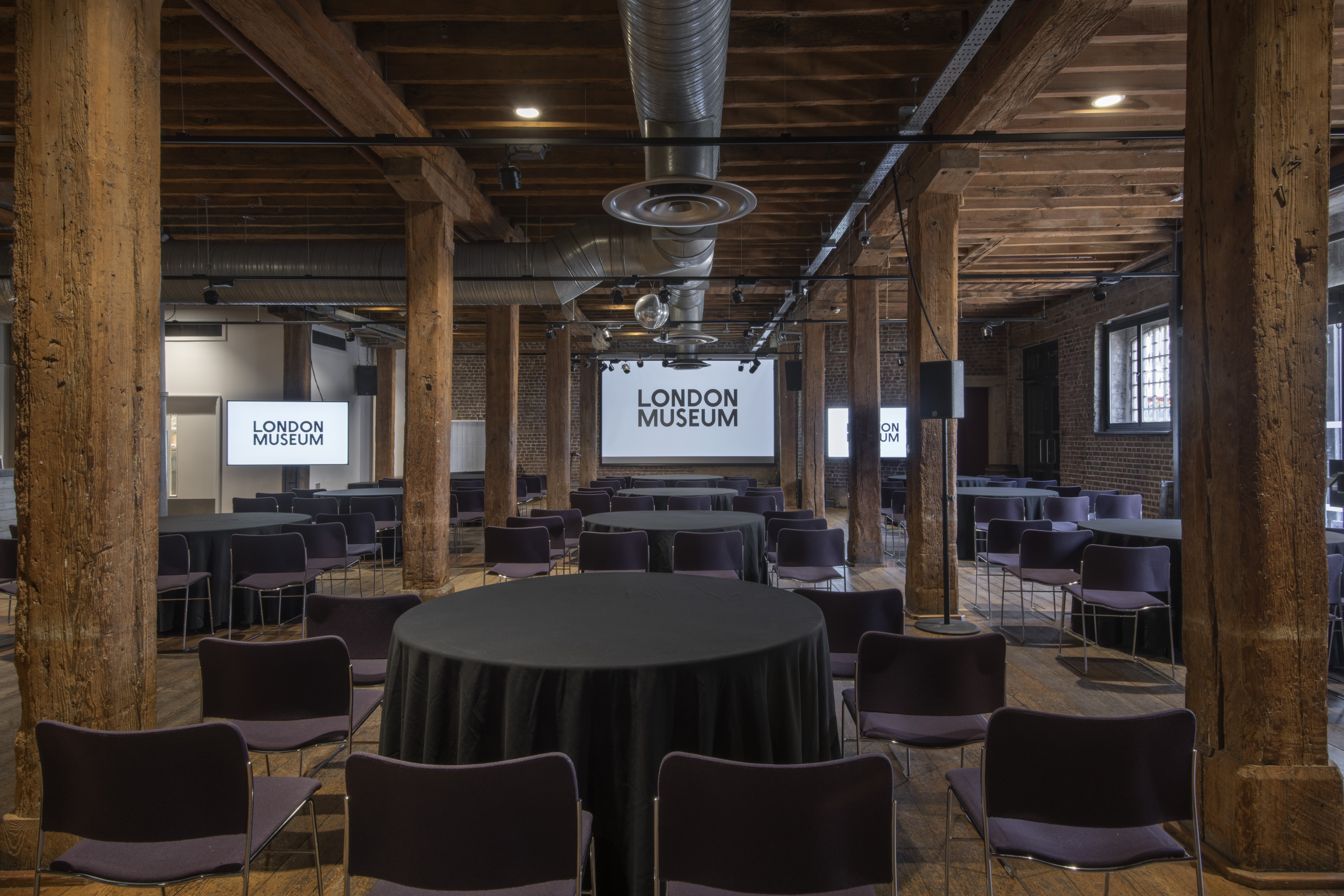 Riverside Room at London Museum Docklands, ideal for corporate meetings and presentations.