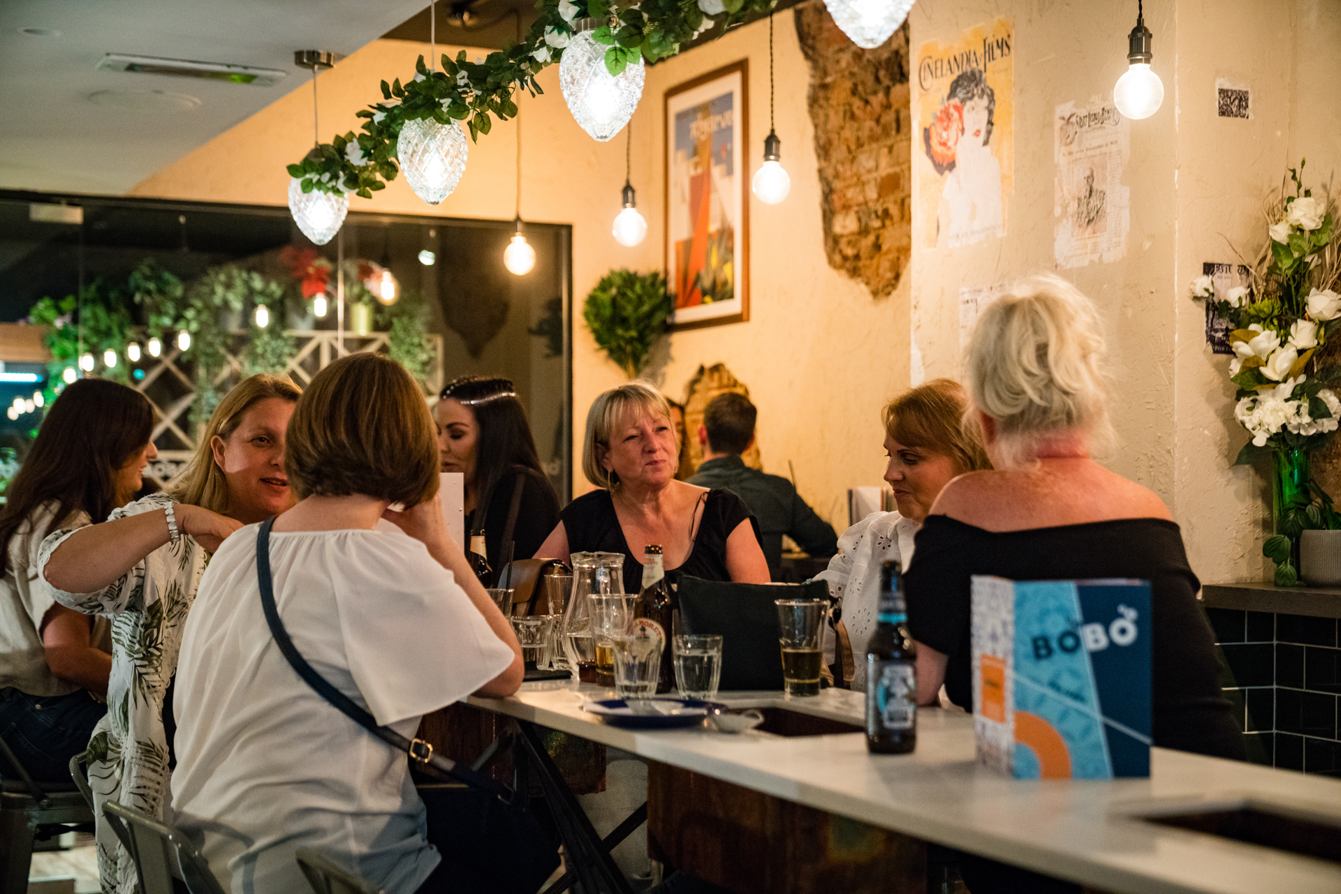 Vibrant networking event at BoBo venue with warm lighting and stylish decor.