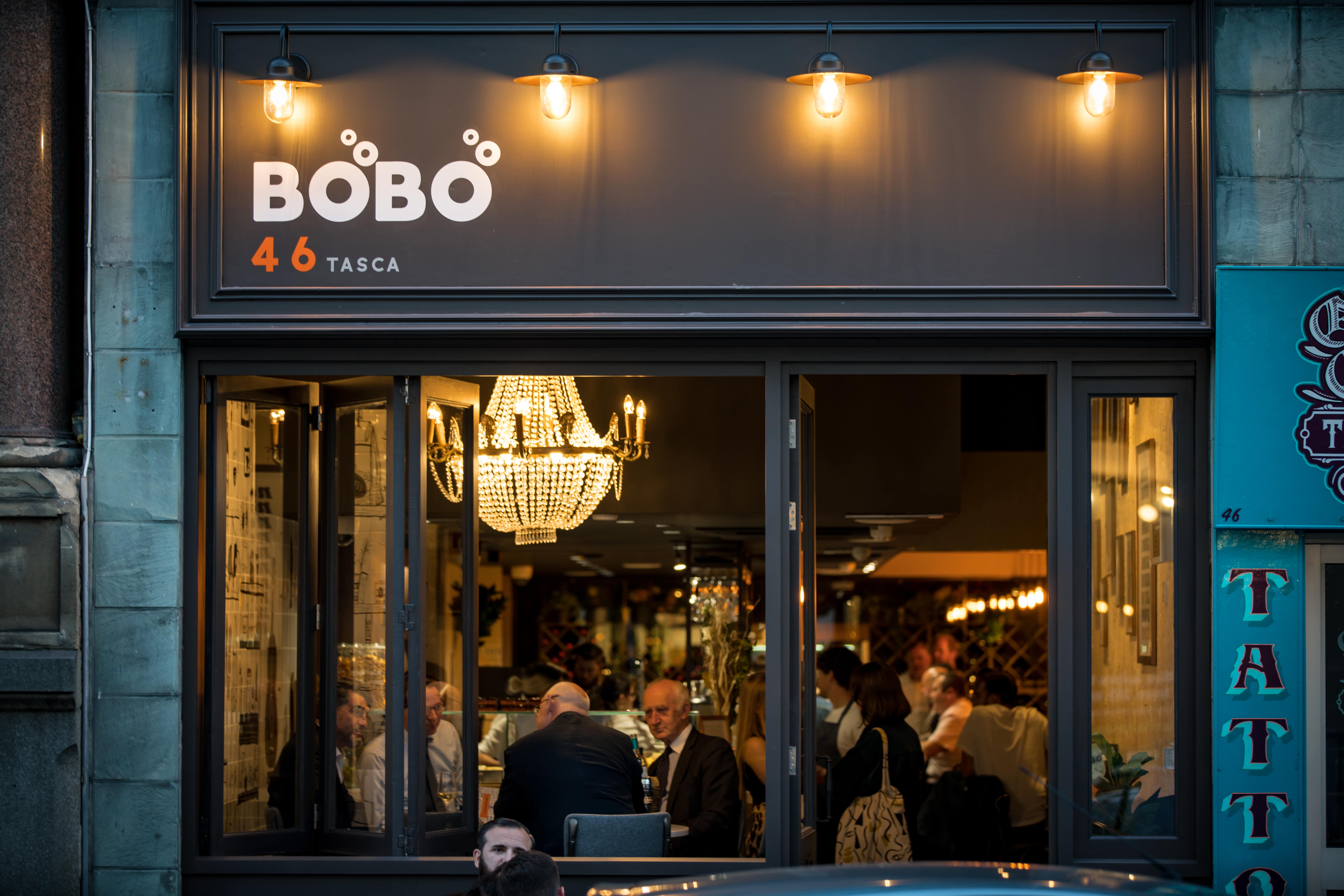 Stylish restaurant venue in BoBo with warm lighting for intimate gatherings and corporate dinners.