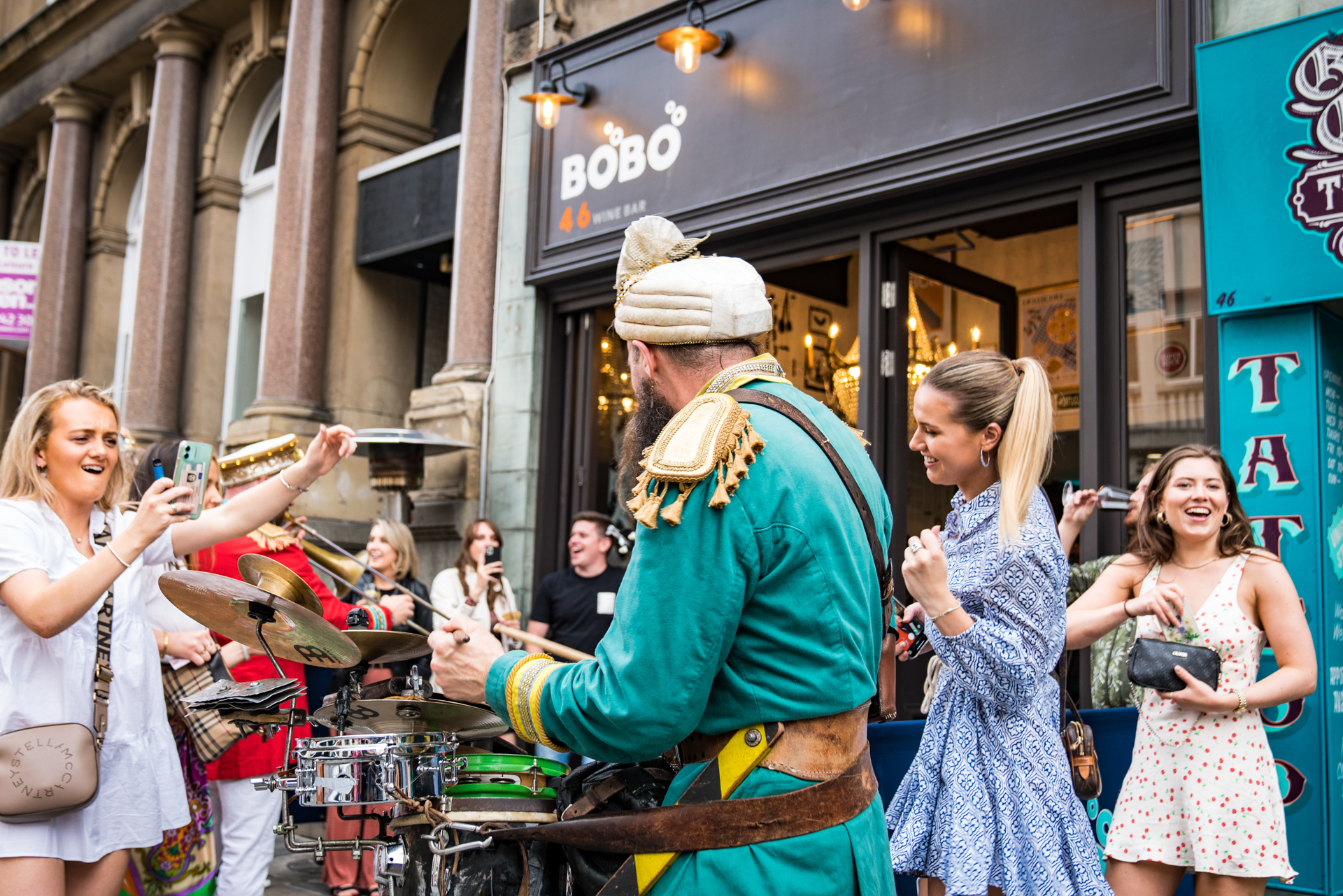 Vibrant street performance at Whole Venue in BoBo, perfect for lively events and gatherings.