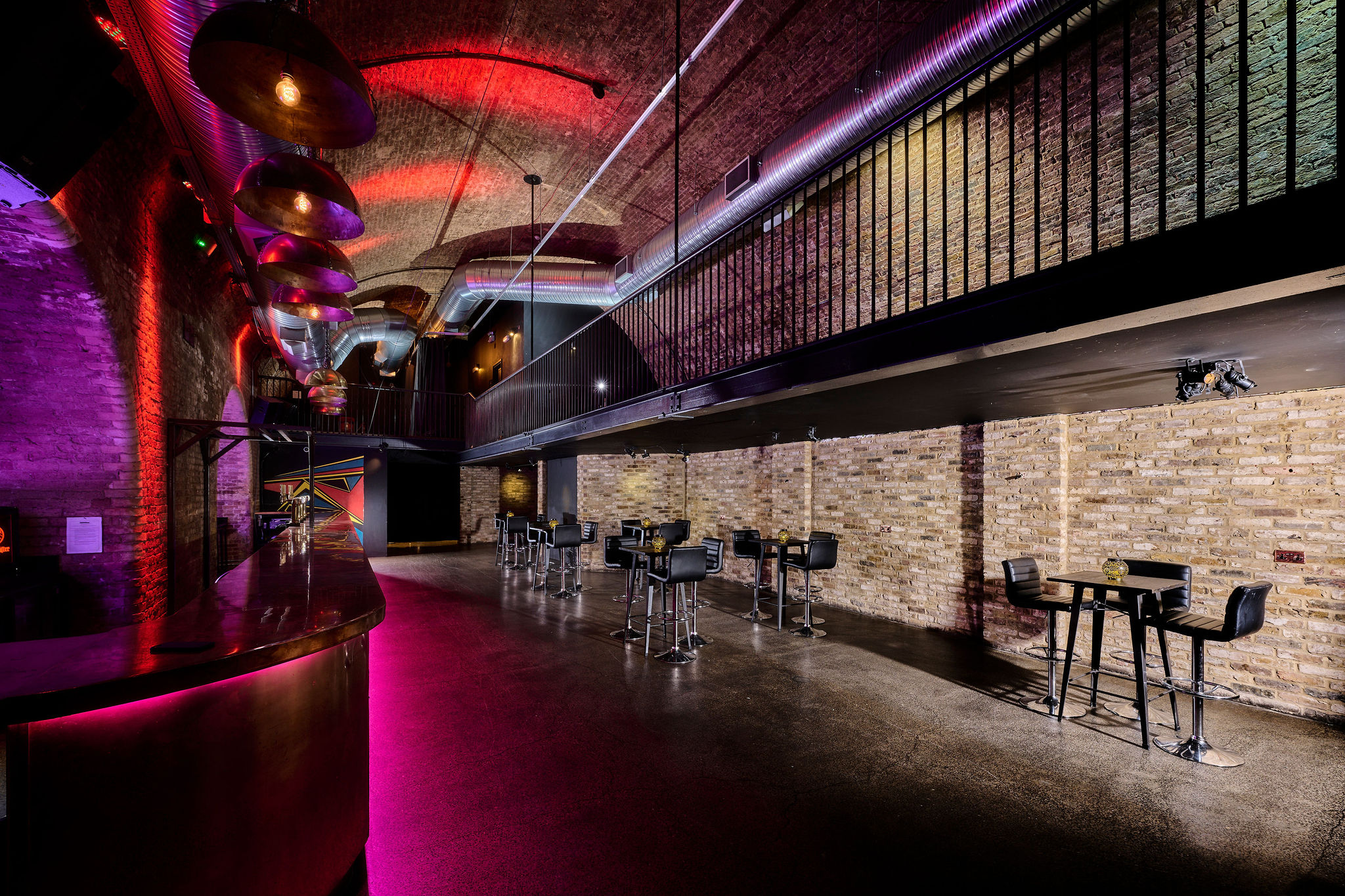 Modern event space Arch 3 at The Steel Yard with exposed brick, ideal for networking events.