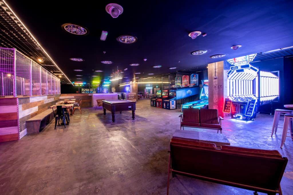 Full Venue Hire at Boom Battle Bar with vibrant lighting for team-building and parties.