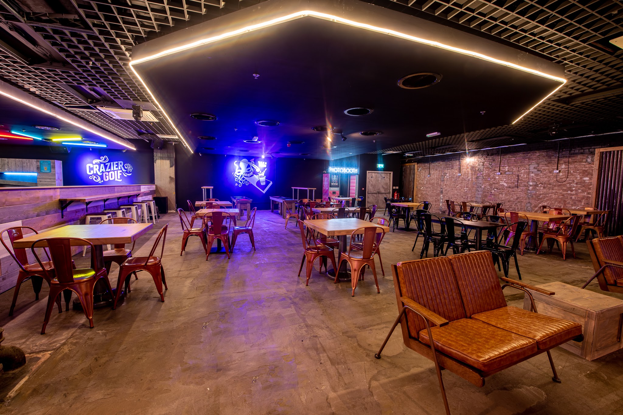 Boom Battle Bar's industrial venue with exposed brick, perfect for flexible events.