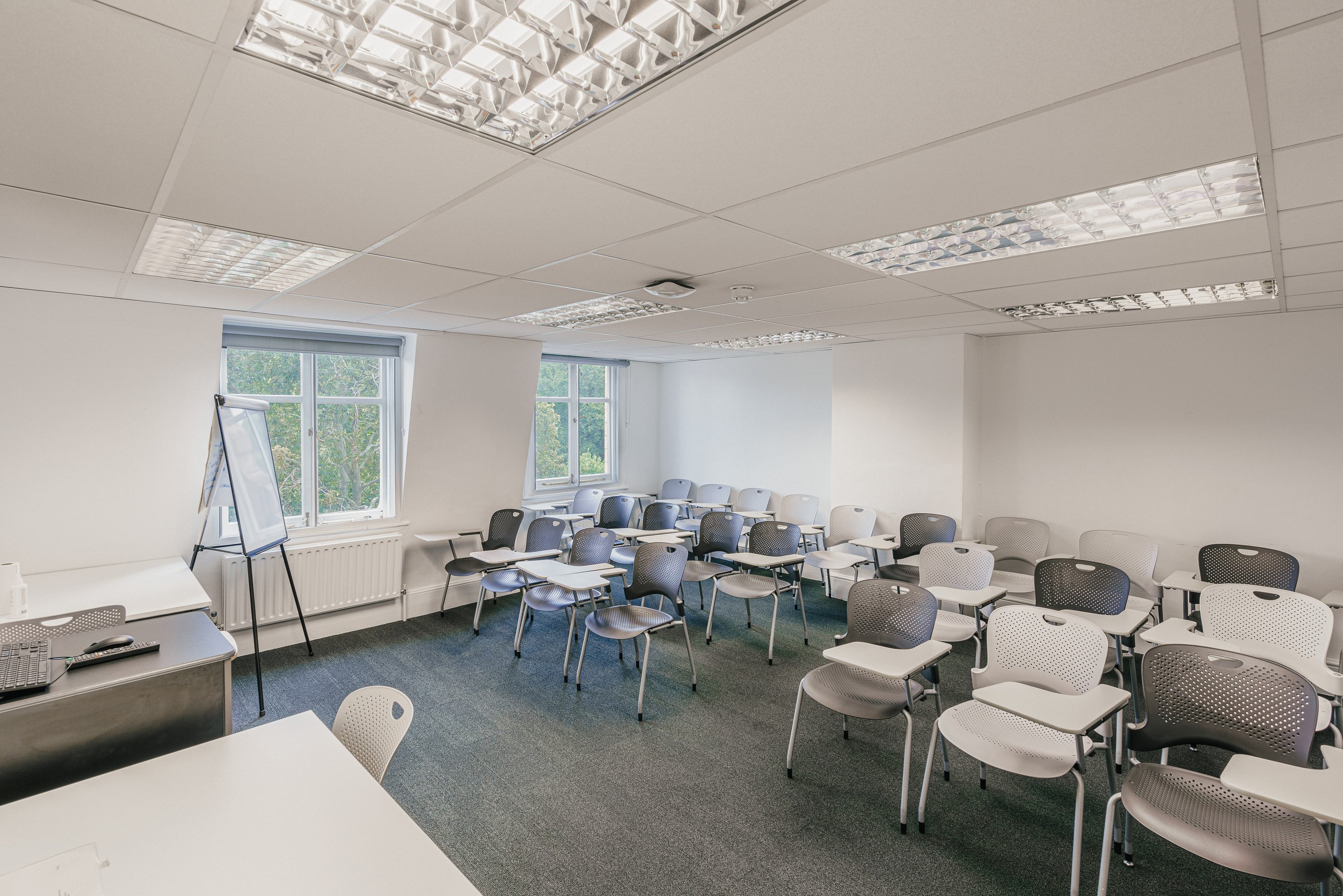 Versatile meeting room at CIEE London, ideal for training sessions and workshops.