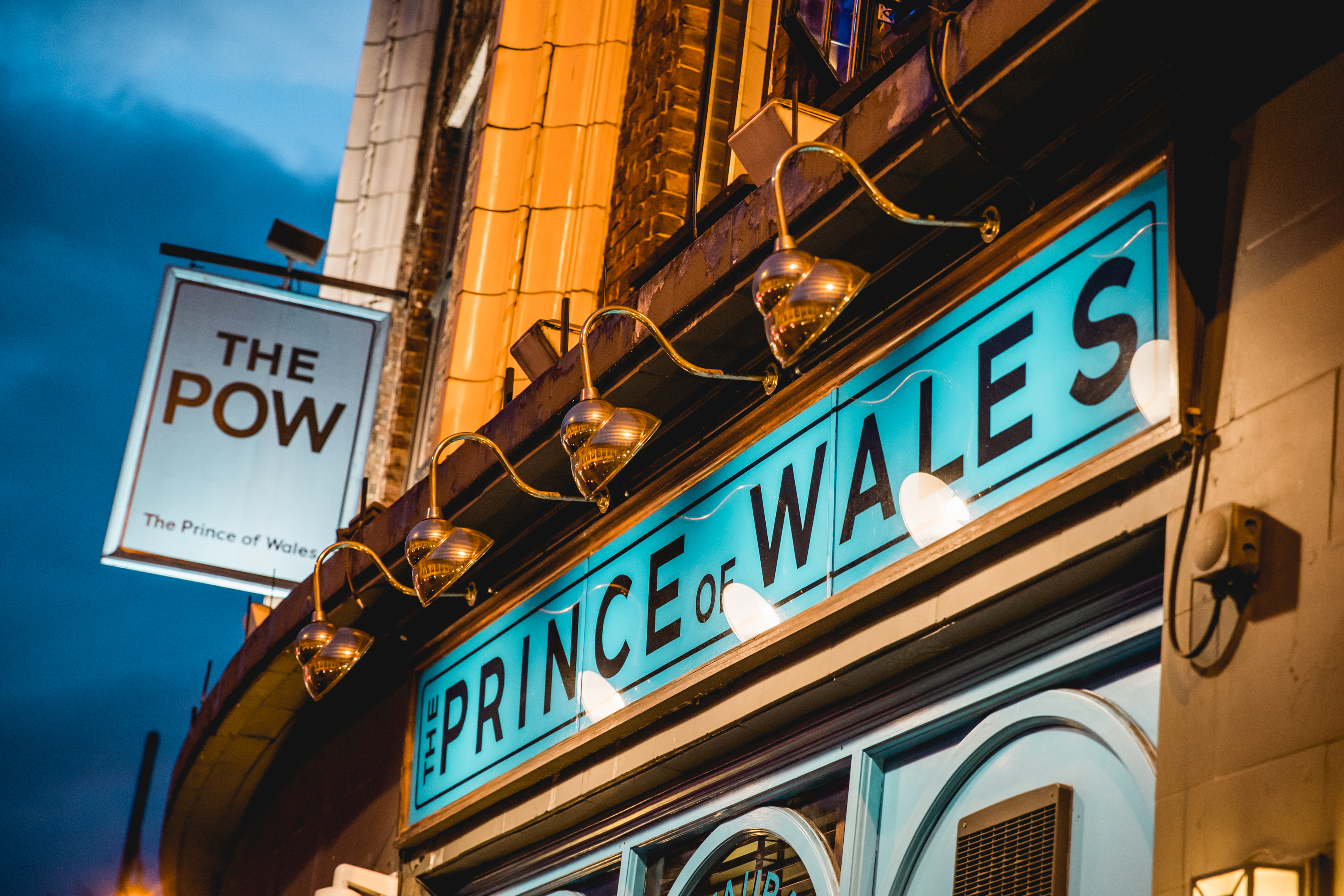 The Prince of Wales Pub in Brixton: vibrant venue for events, warm lighting atmosphere.