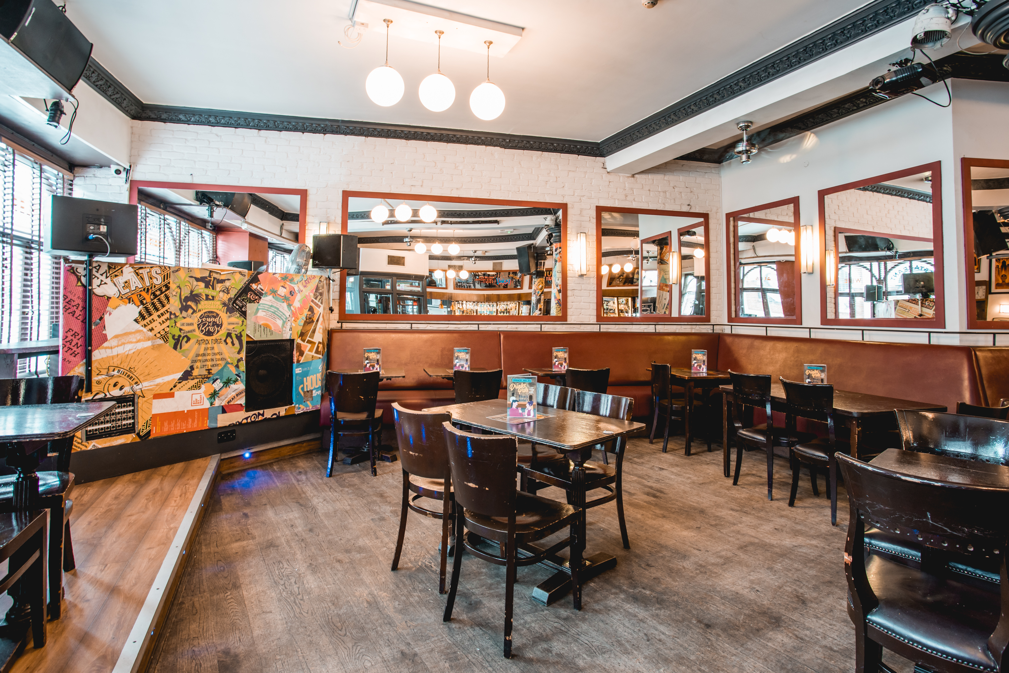 The Prince Of Wales Pub event space with booth seating, ideal for gatherings and meetings.