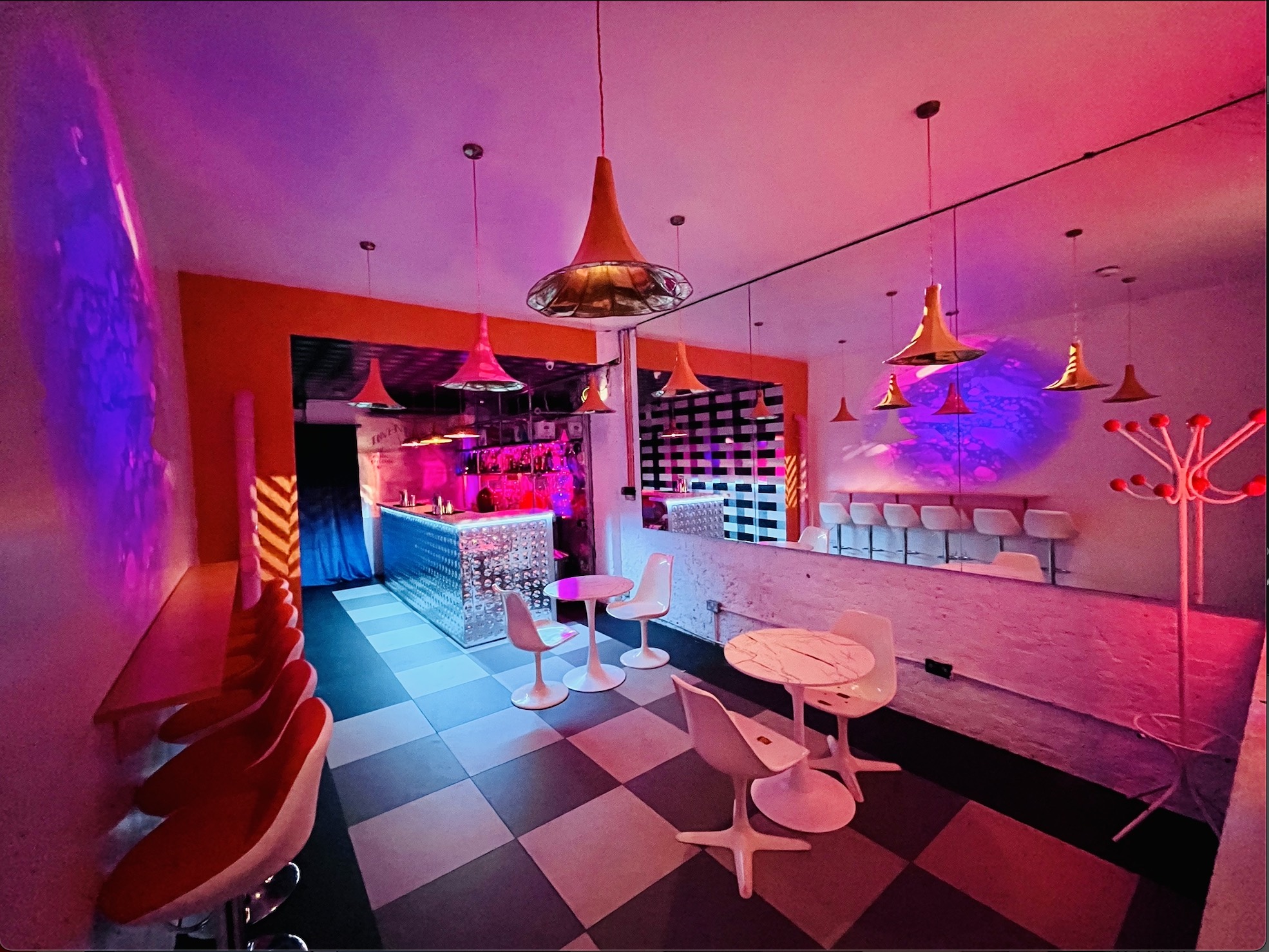 Vibrant Bonkers Bar event space with modern furnishings for networking and cocktail receptions.