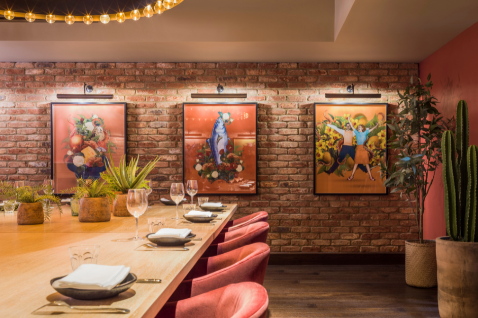 BIBO Private Dining at Virgin Hotels, stylish wooden table for intimate gatherings.