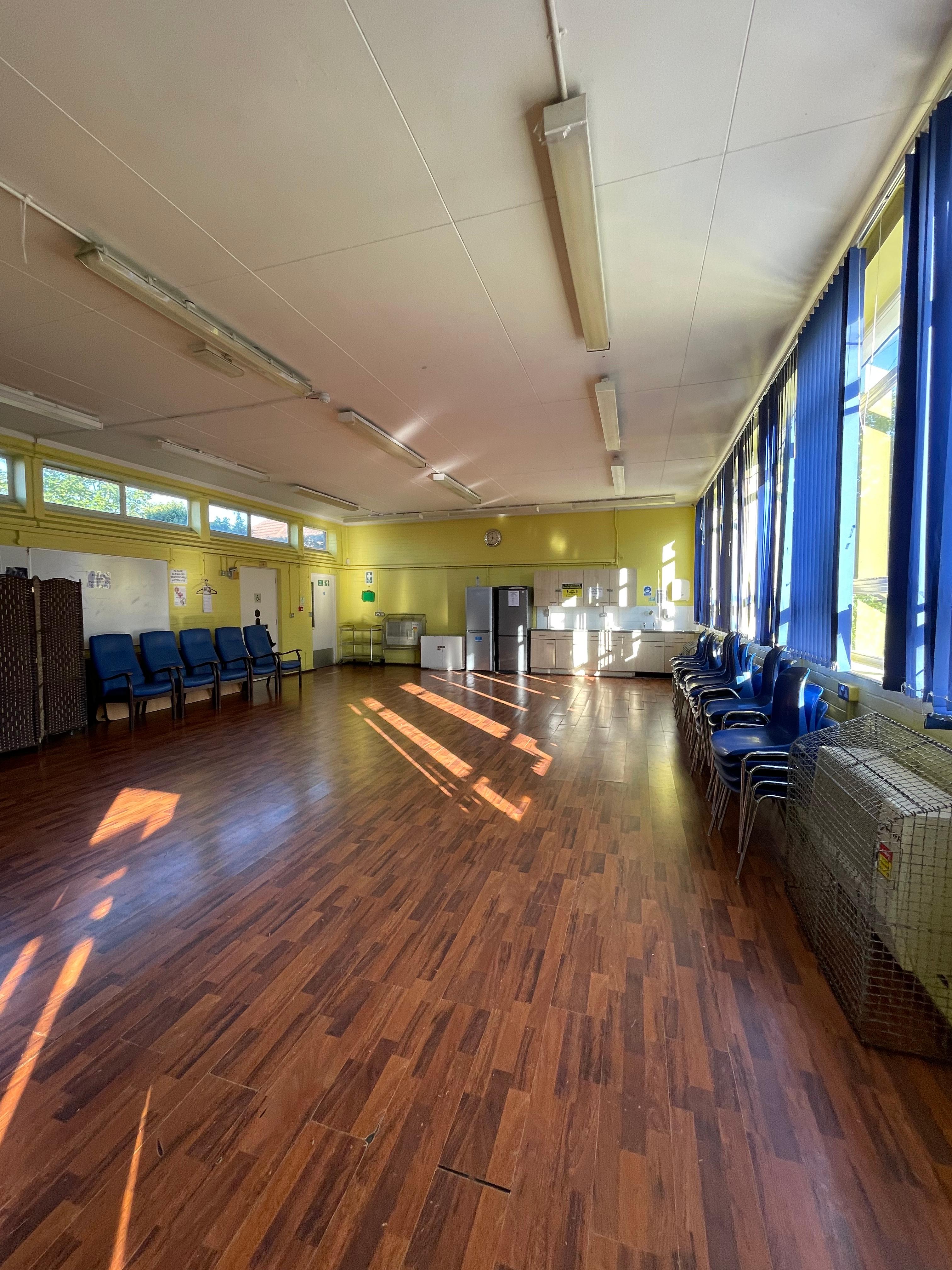 William Hall meeting room with natural light, ideal for events and gatherings.