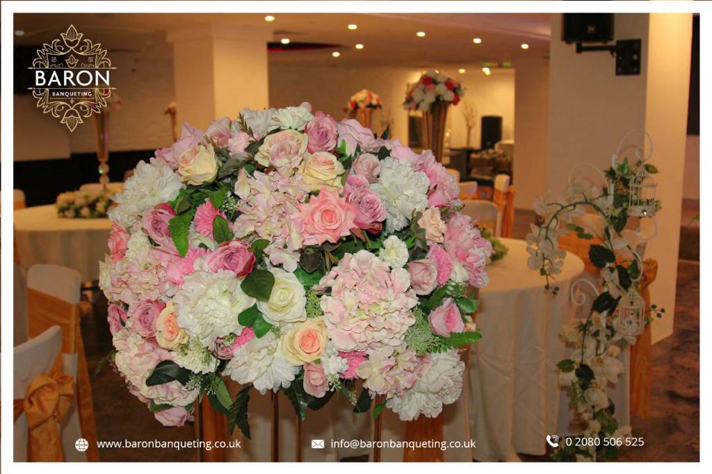 Elegant floral centerpiece in Baron Lounge, perfect for weddings and formal events.