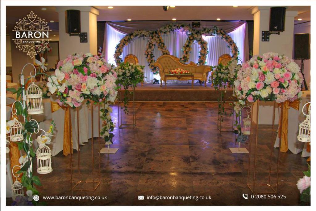 Elegant Baron Lounge event space with floral decor, ideal for weddings and gatherings.