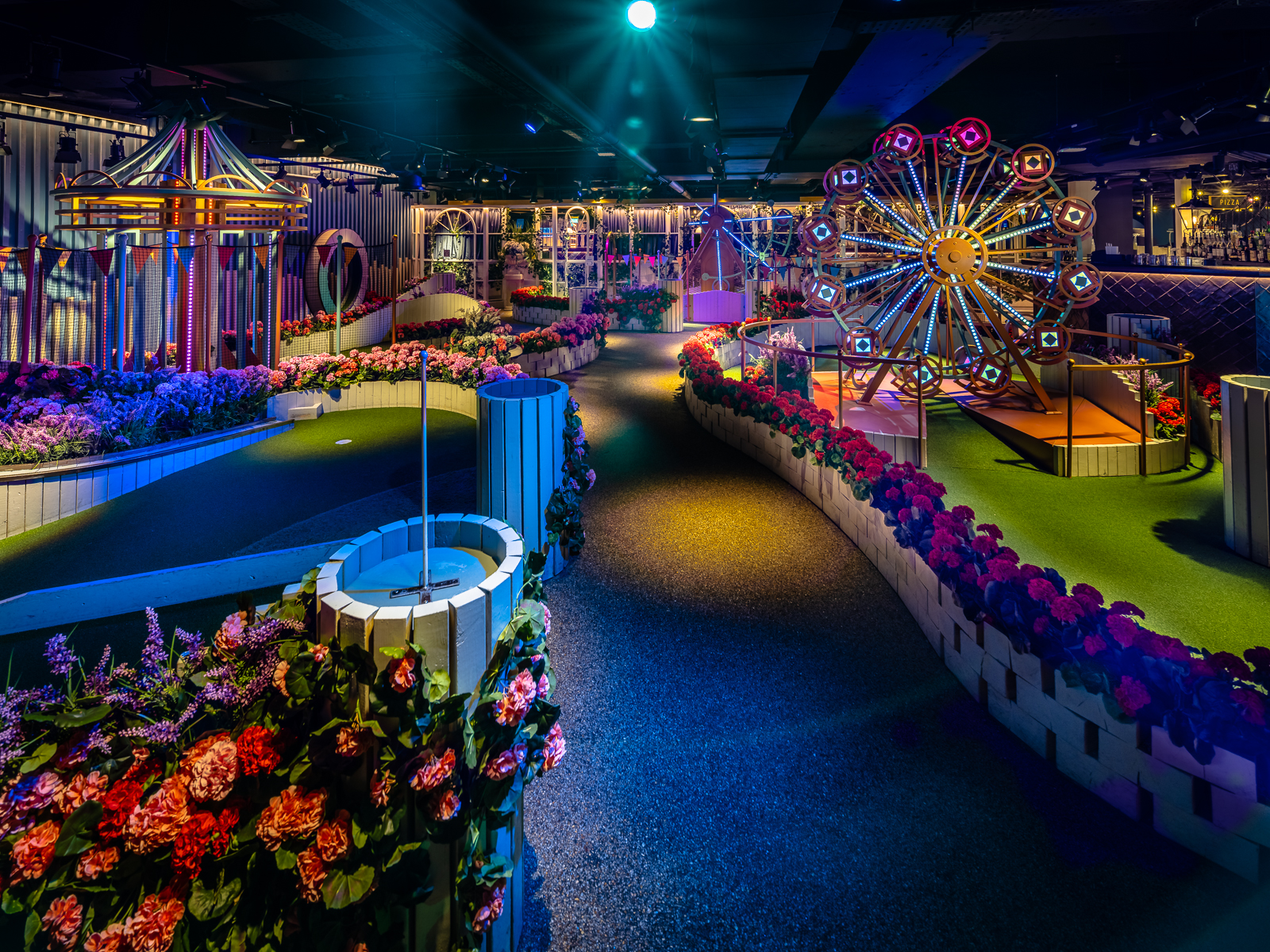 Vibrant Palm Lounge with floral decor, ideal for themed events and gatherings.