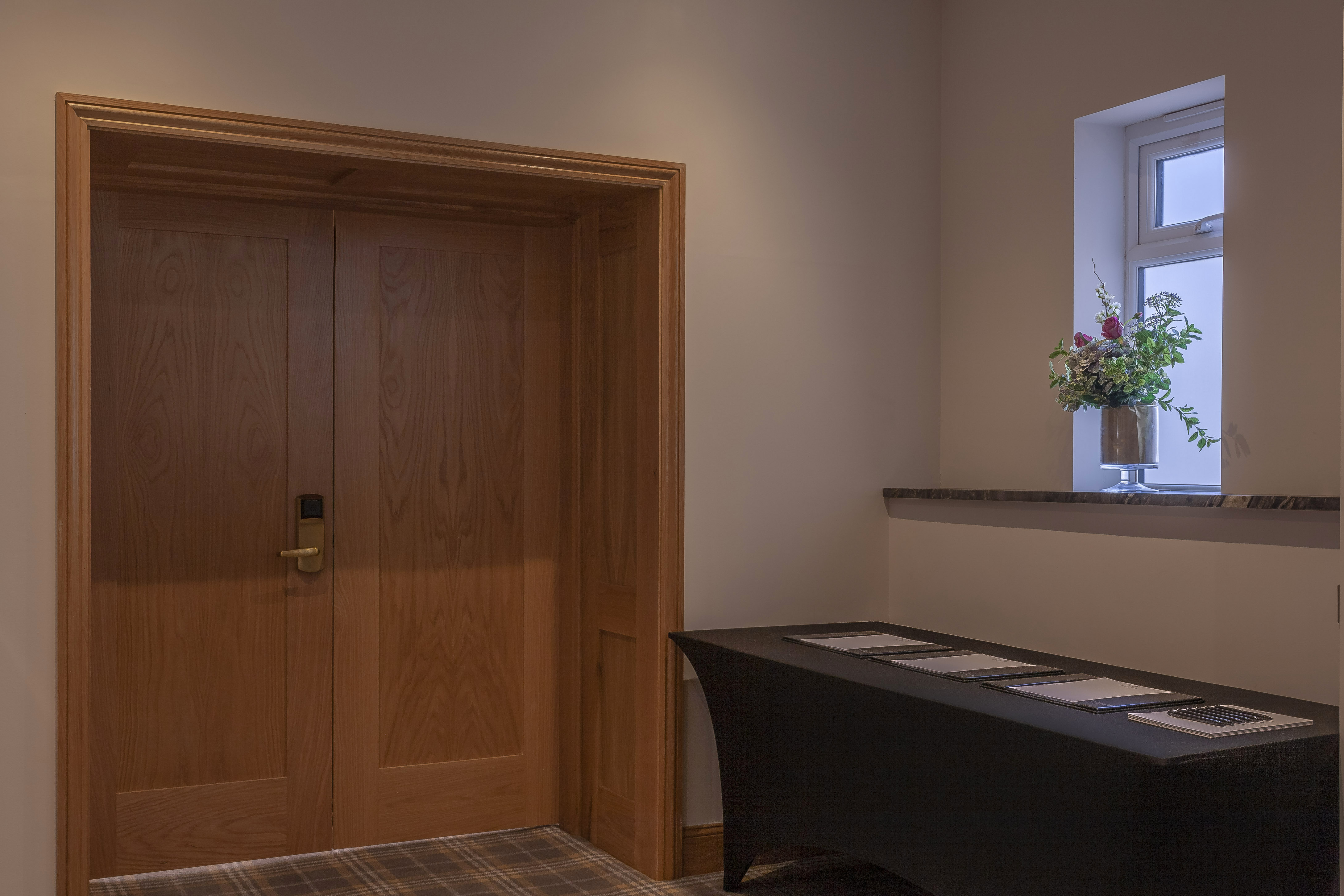 Cromwell Room entrance at Oatlands Park Hotel, ideal for elegant events and gatherings.