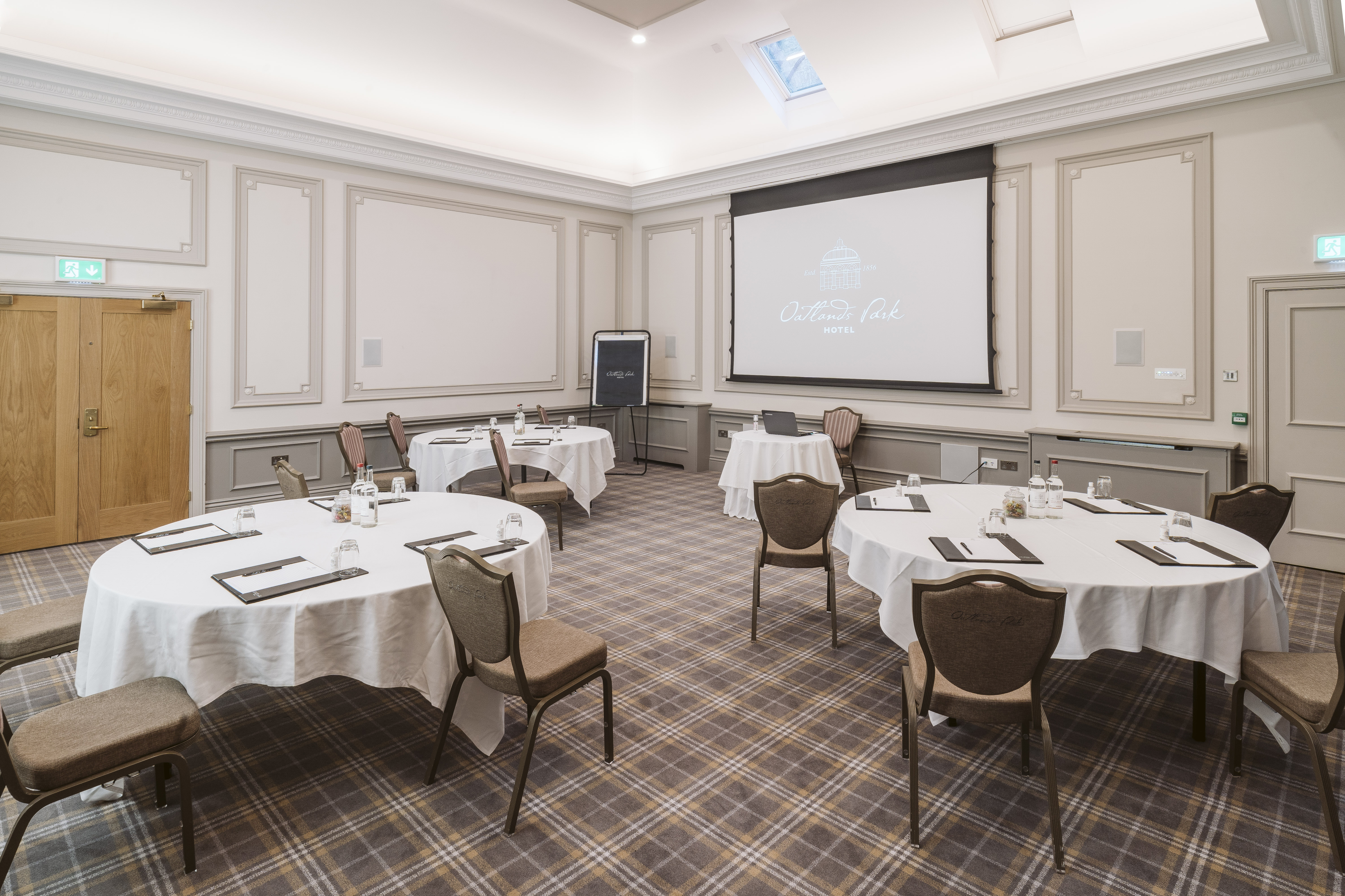 Cromwell Room at Oatlands Park Hotel, ideal for meetings and events with natural light.