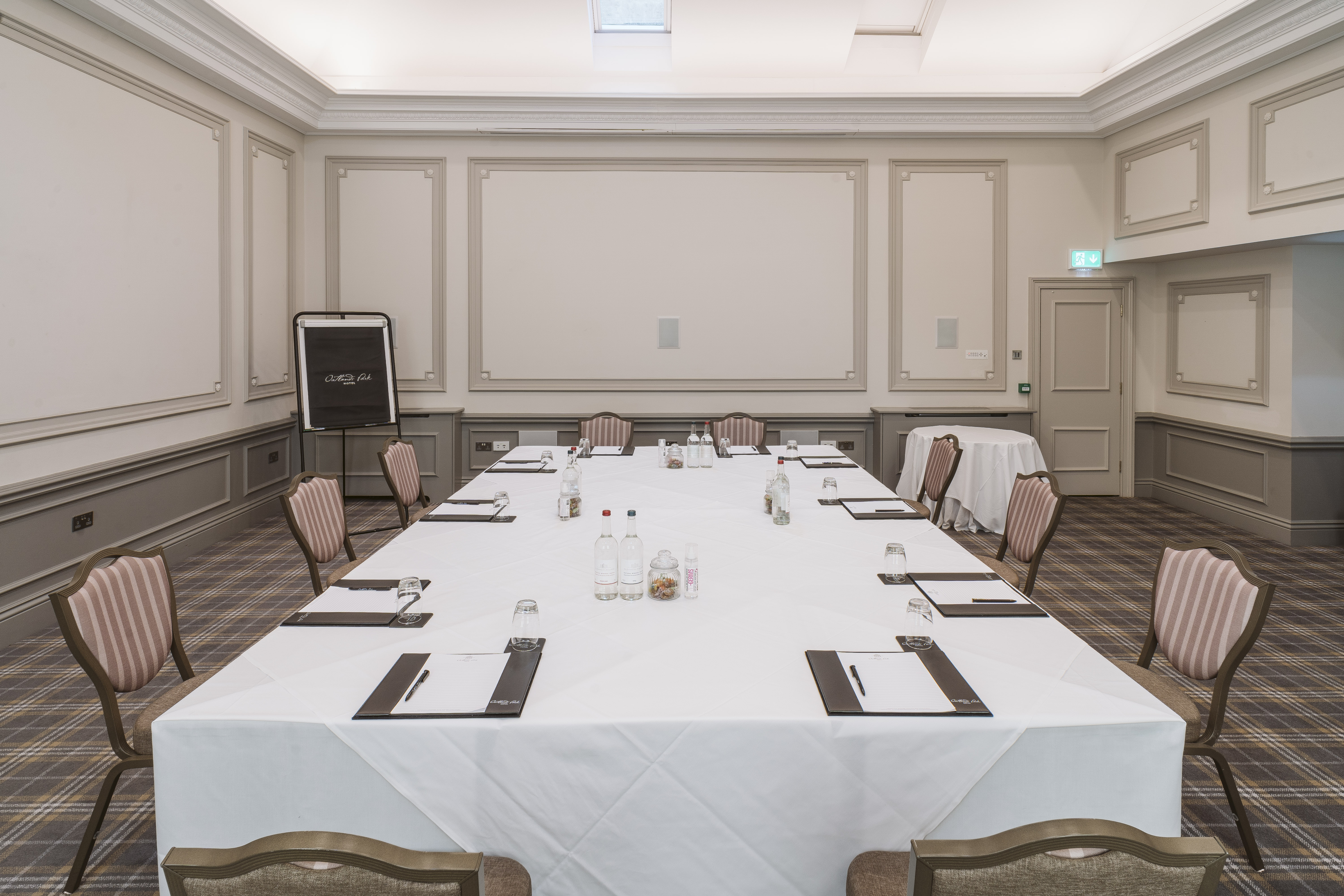 Cromwell Room at Oatlands Park Hotel, set for a professional meeting with elegant decor.
