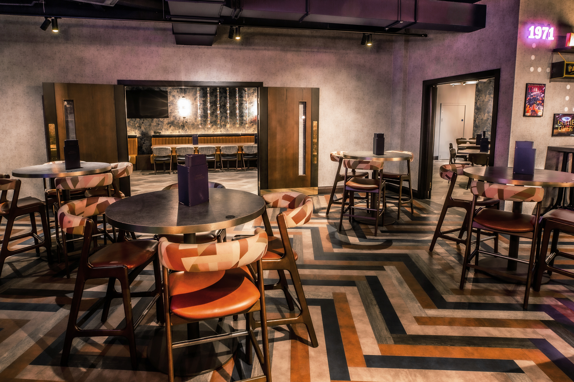 Modern event space at Puttshack Watford, ideal for networking and gatherings.