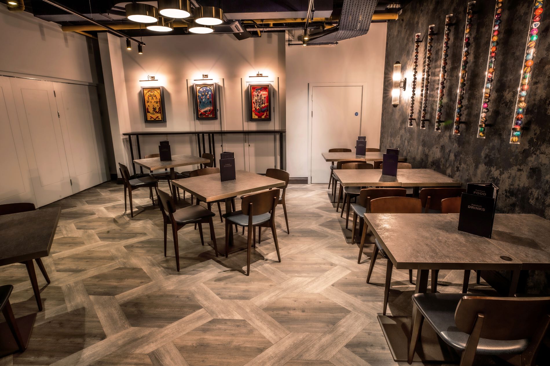 Topaz private room at Puttshack Watford, modern event space for gatherings and workshops.