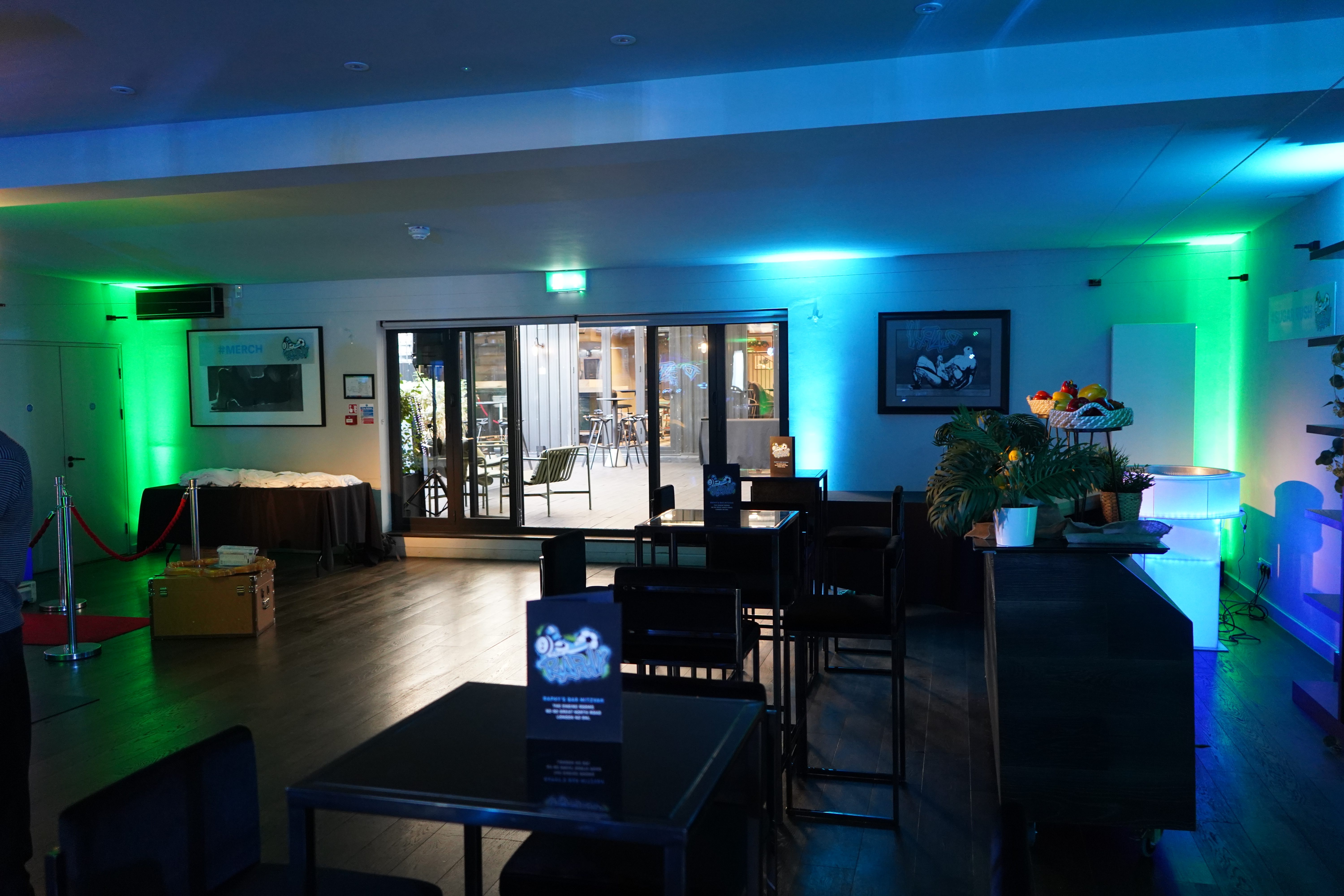 Stylish V8 Room event space with modern decor, ideal for networking and social gatherings.