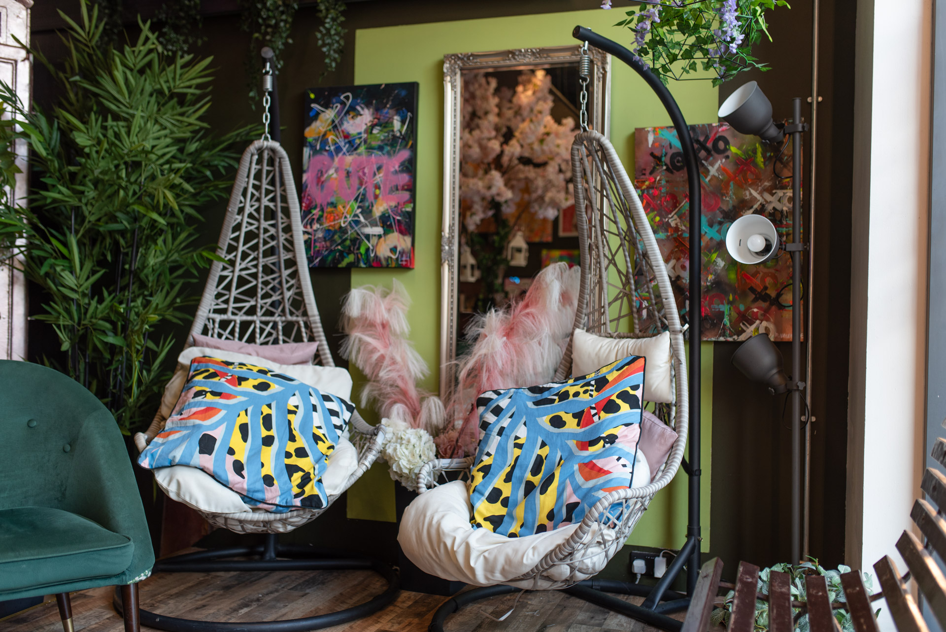 Vibrant lounge with hanging chairs for casual networking at On The Hush events.