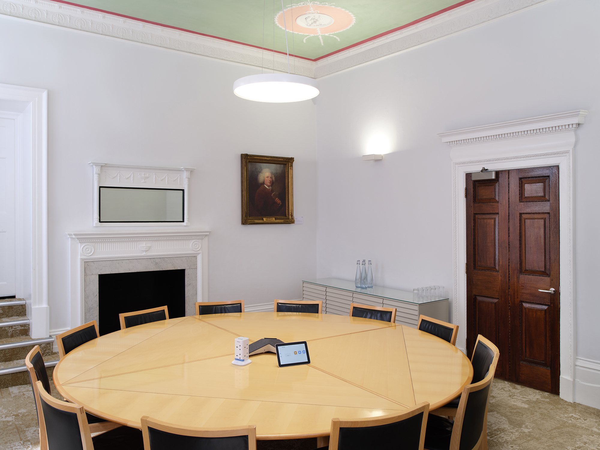 The Shipley Room at RSA House: elegant meeting space with round table for corporate events.