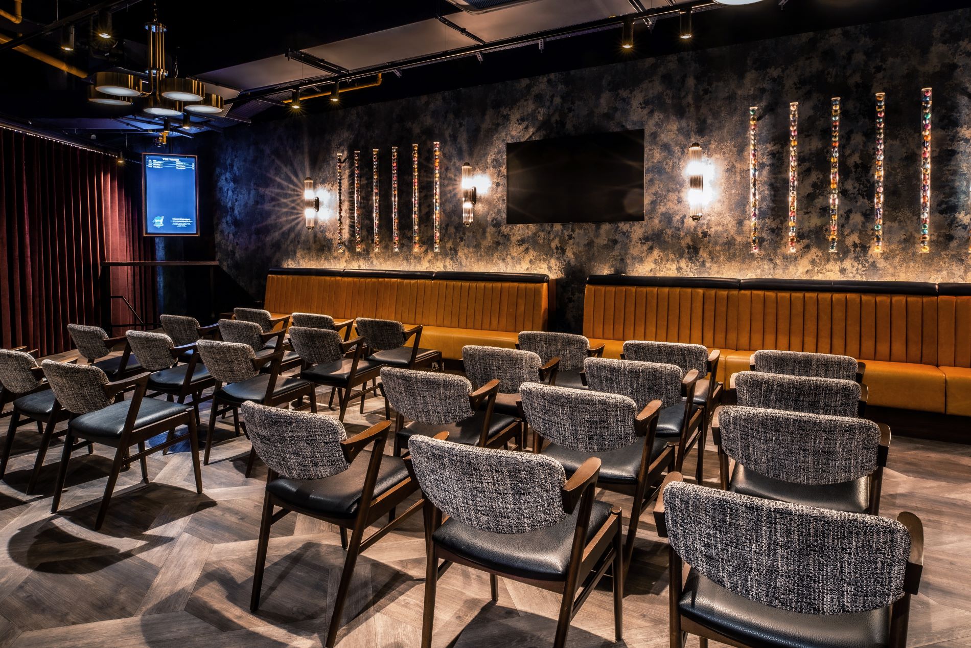 Emerald Private Room at Puttshack Watford, stylish meeting space for corporate events.