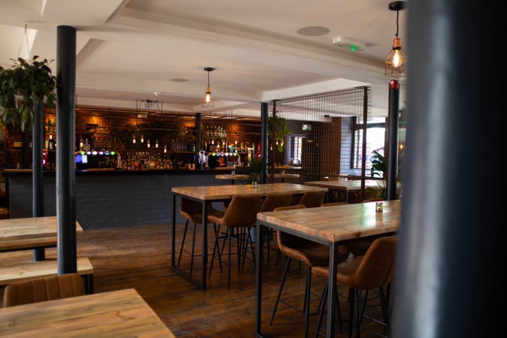 Stylish venue with warm lighting for intimate gatherings and networking events.