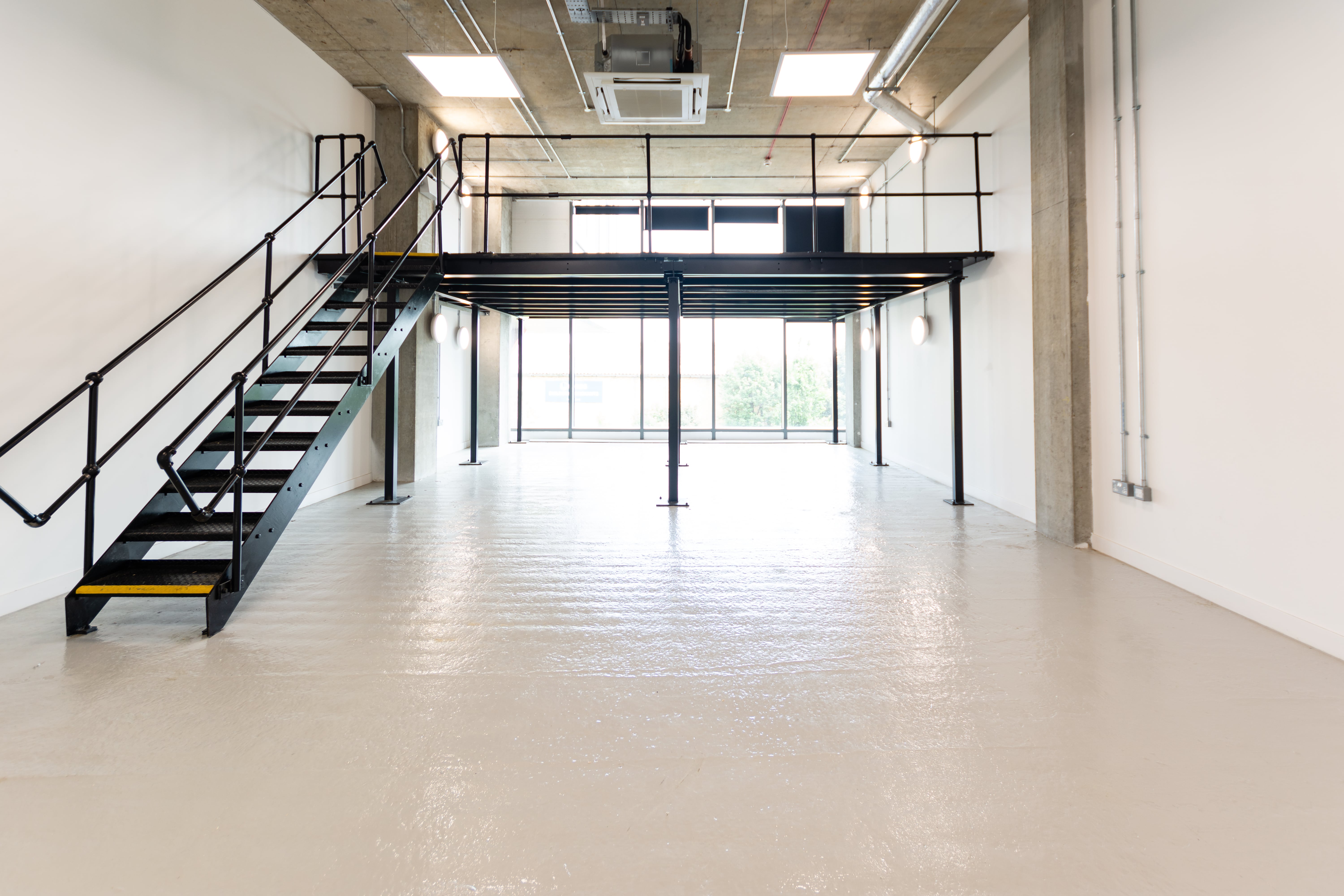 Creative office space with natural light for meetings and events in Parallels.