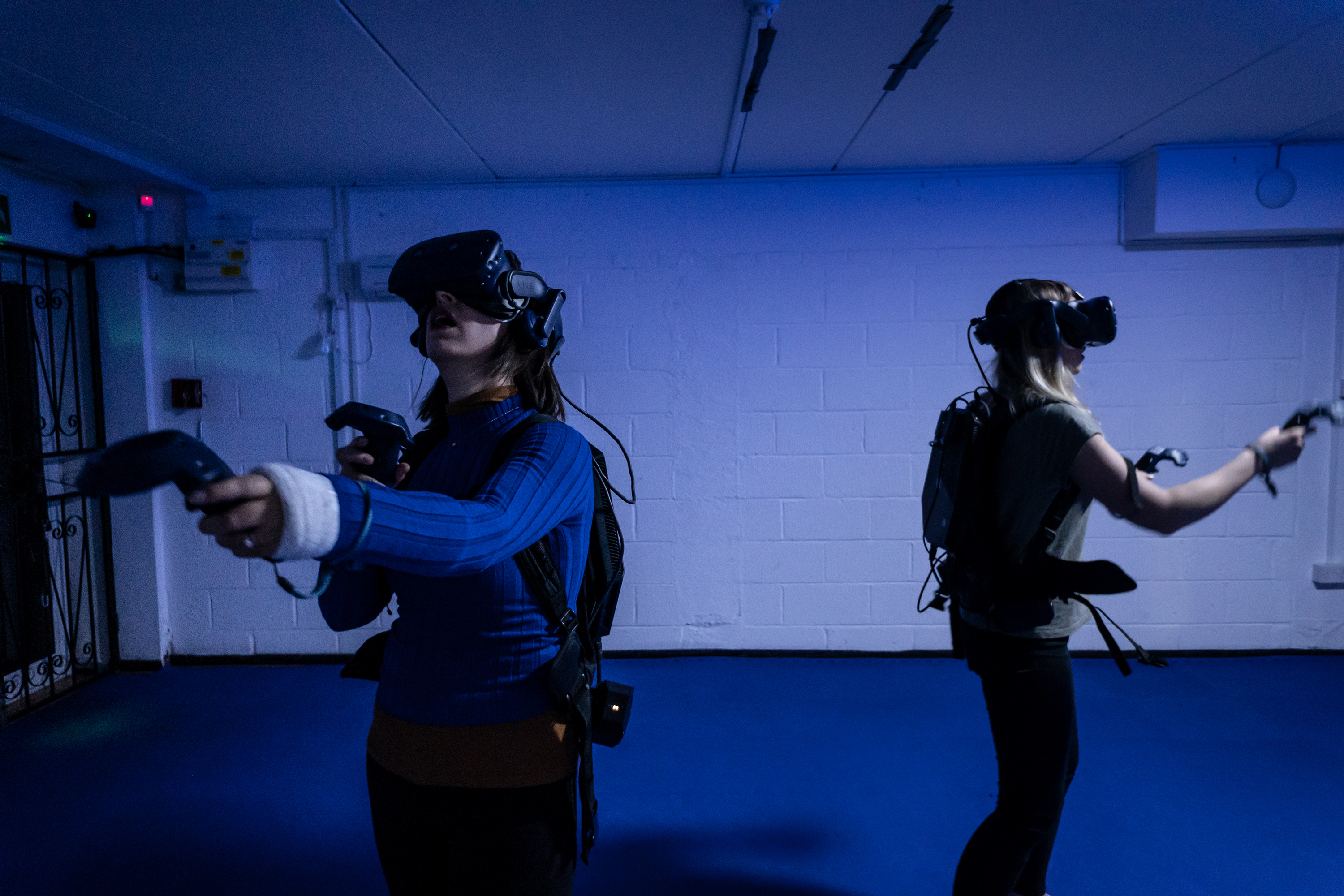 "Participants enjoying immersive VR at DNA Virtual Reality Arcade, Camden event experience."