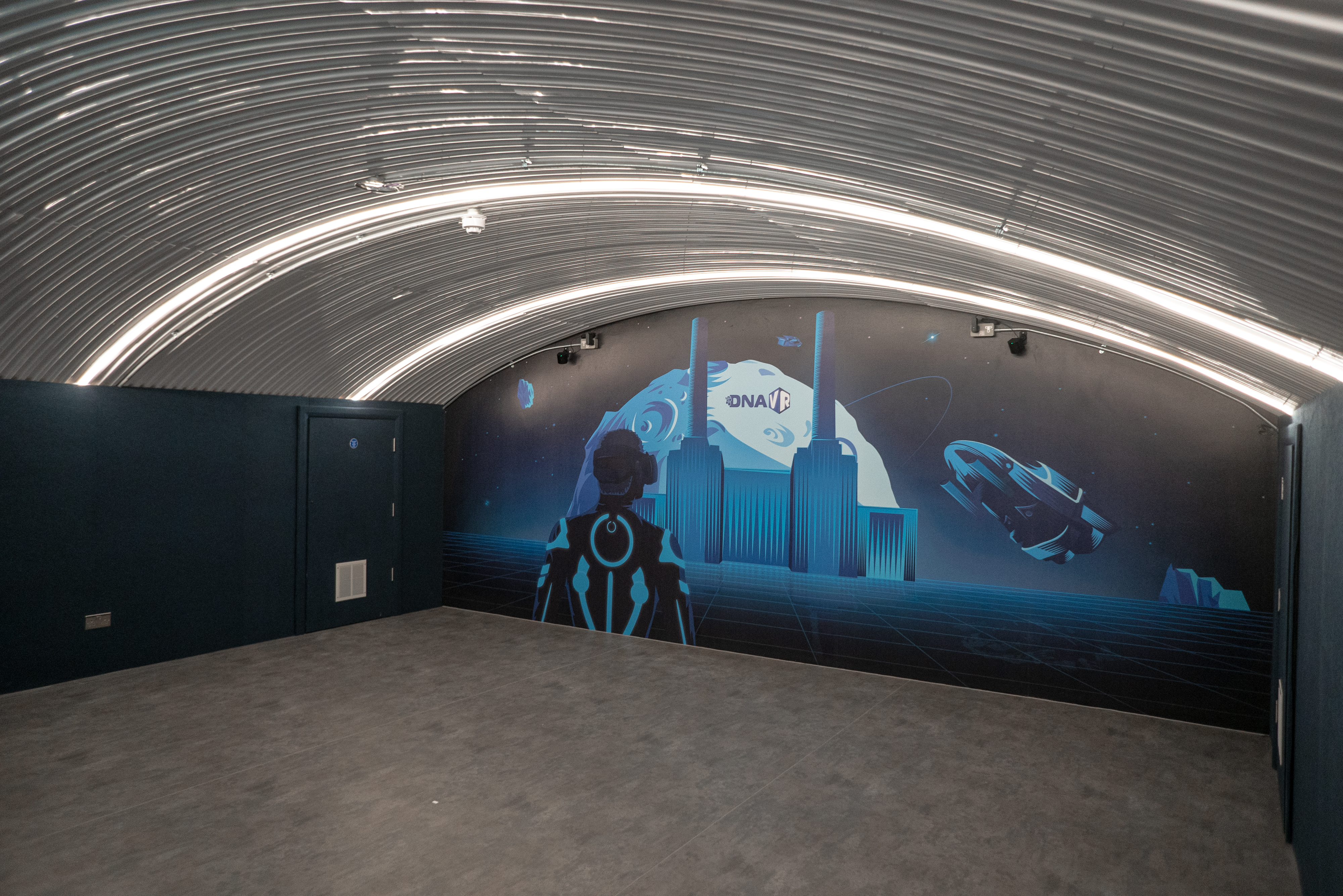 DNA VR Battersea Power Station: Futuristic event space with arched ceiling for tech conferences.