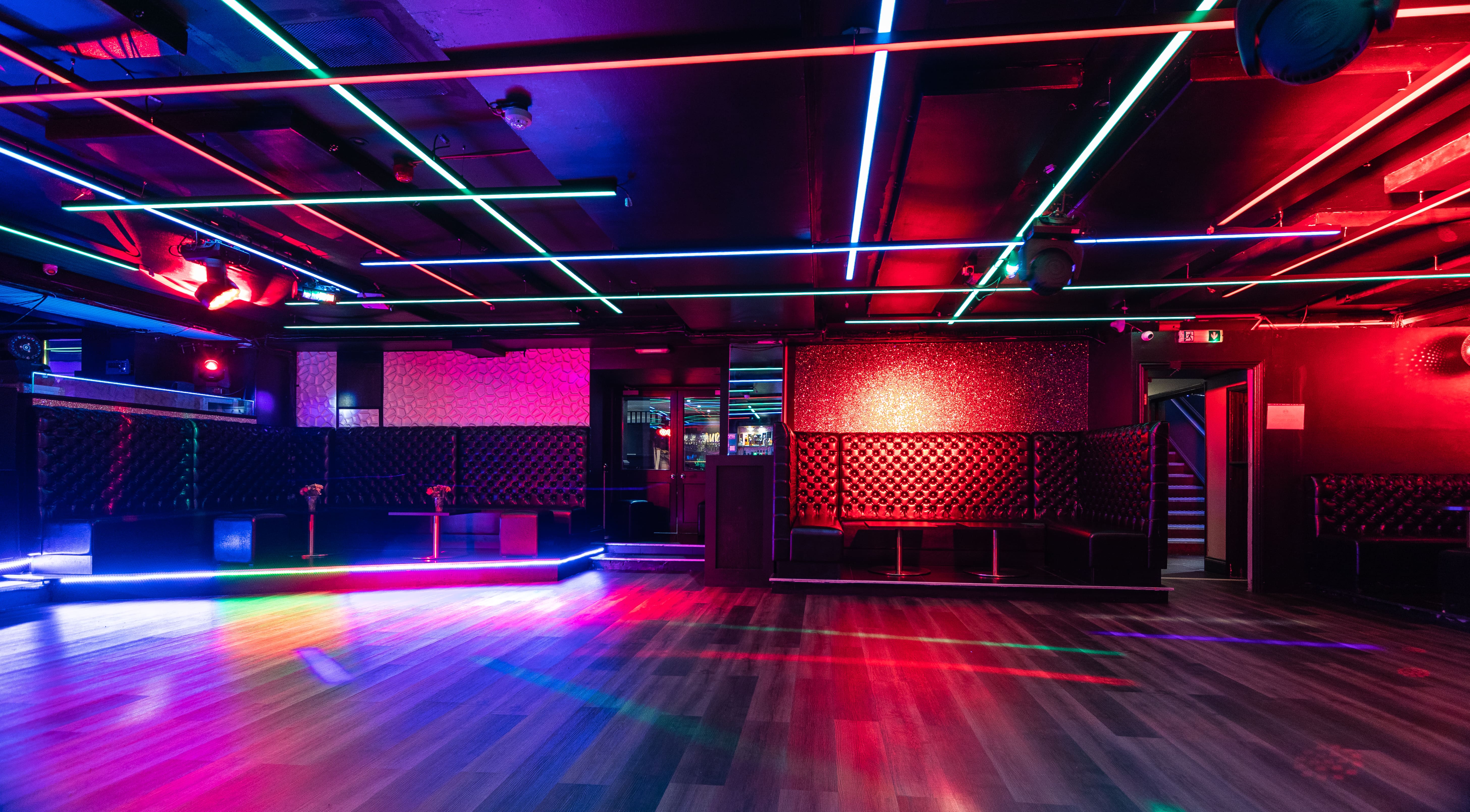 Vibrant event space in Aura Tunbridge Wells with dynamic lighting for parties and gatherings.