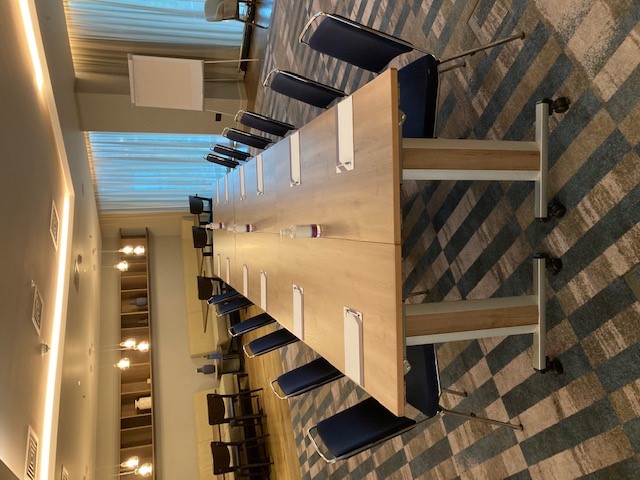 Hyatt Regency Manchester Club Lounge meeting room with a long table, ideal for workshops.